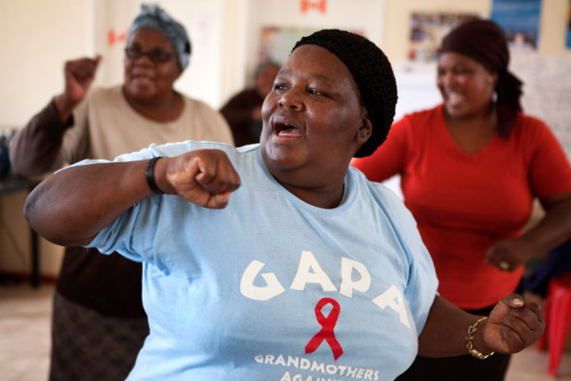 A member of Grandmothers Against Aids and Poverty (GAPA) takes part in an exercise class in Cape Town's Khayelitsha township, February 23, 2010.