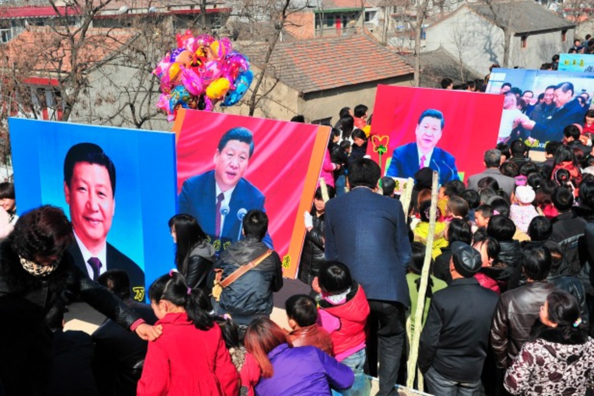 <p>Residents hold posters of the newly appointed chief of China’s Communist Party Xi Jinping and the disputed islands, known as D… to the Chinese zodiac. REUTERS/Stringer (CHINA – Tags: SOCIETY POLITICS) CHINA OUT. NO COMMERCIAL OR EDITORIAL SALES IN CHINA</p>
