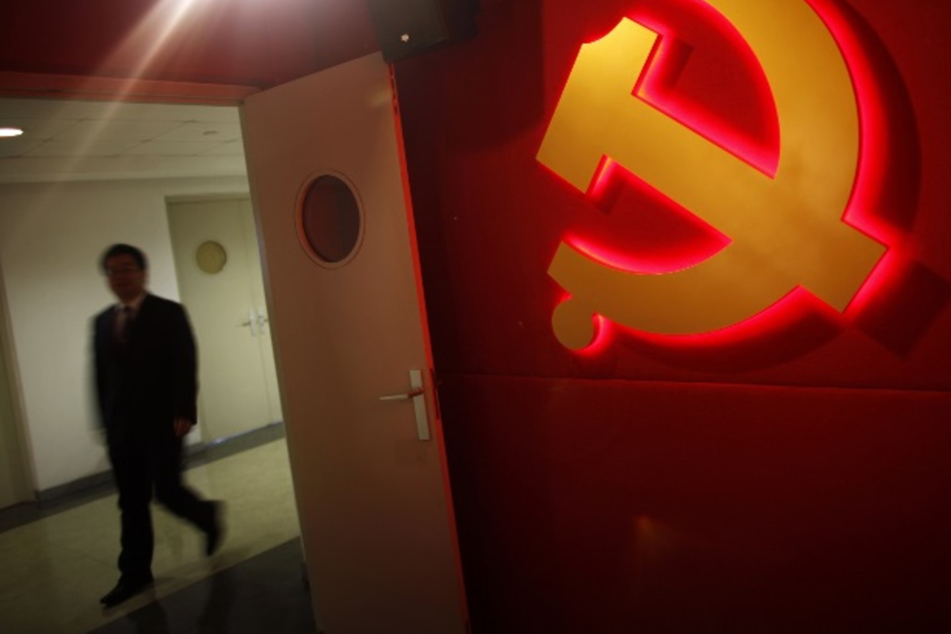<p>A trainee walks past a communist party logo as he attends a training course at the communist party school called China Executi…ios on everything from disease outbreaks to train wrecks. REUTERS/Carlos Barria (CHINA – Tags: POLITICS SOCIETY BUSINESS LOGO)</p>
