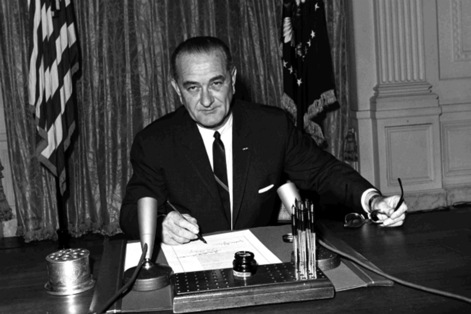 <p>President Johnson signs “Gulf of Tonkin” Resolution</p>
