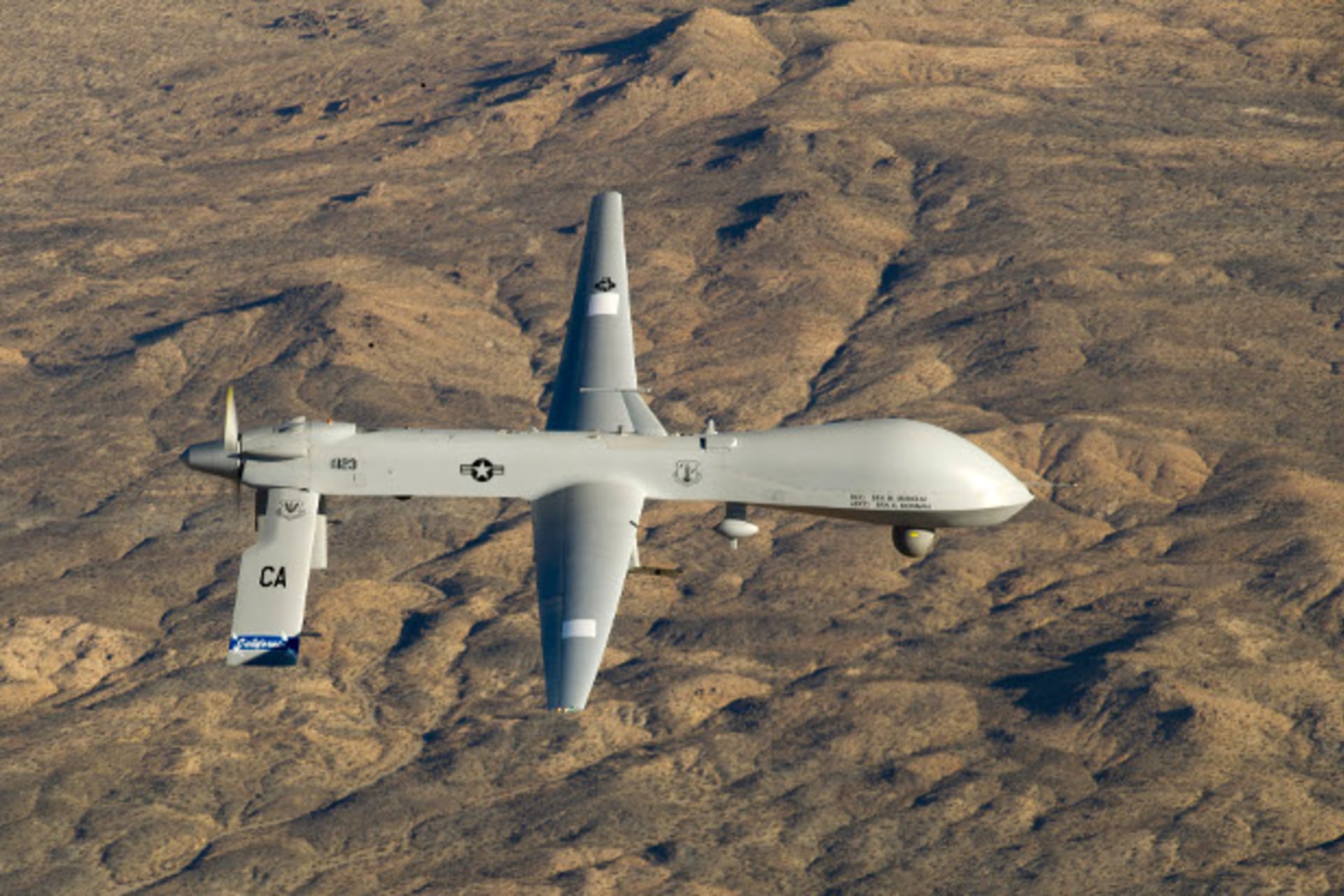 A U.S. Air Force MQ-1 Predator unmanned aerial vehicle assigned to the California Air National Guard's 163rd Reconnaissance Wing flies near the Southern California Logistics Airport in Victorville, California in this January 7, 2012 USAF handou