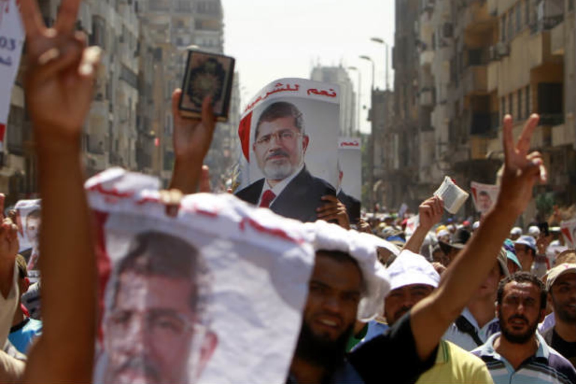 Supporters of deposed Egyptian president Mohamed Morsi shout slogans during a march from Al-Fath Mosque to the defence ministry, in Cairo July 30, 2013 (El Ghany/Courtesy Reuters).
