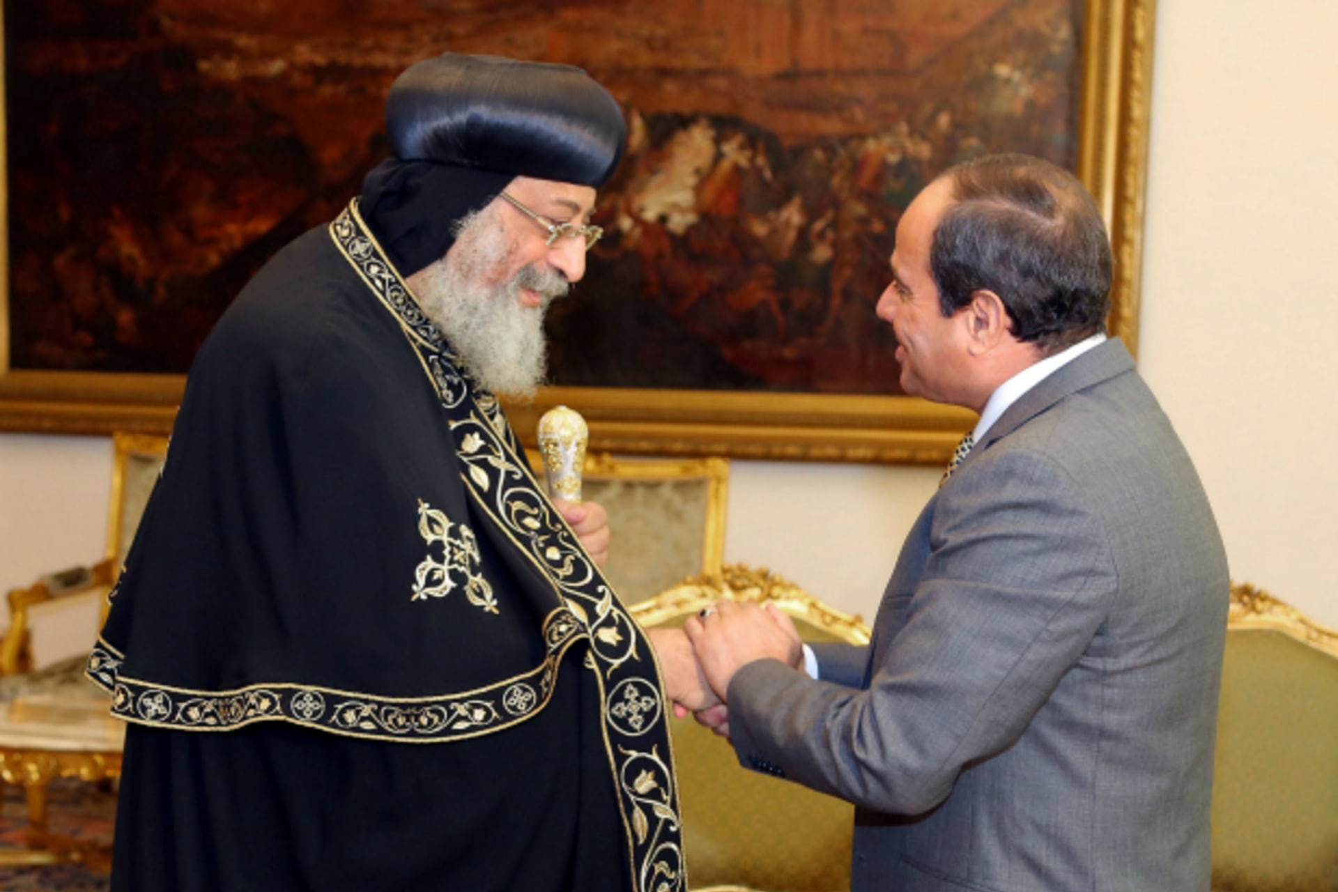 <p>Egyptian President Abdel Fattah al-Sisi greets Egyptian Coptic Pope Tawadros II, head of the Egyptian Coptic Orthodox Church, at the Ittihadiya presidential palace in Cairo (Handout/Reuters).</p>