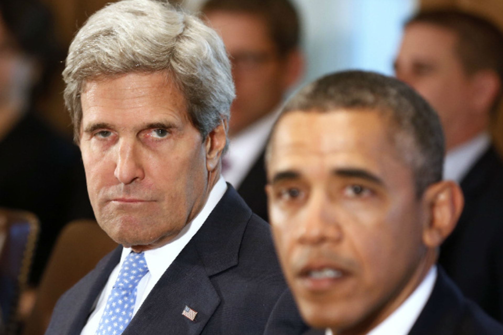 U.S. secretary of state John Kerry listens to U.S. president Barack Obama (Downing/Courtesy Reuters).