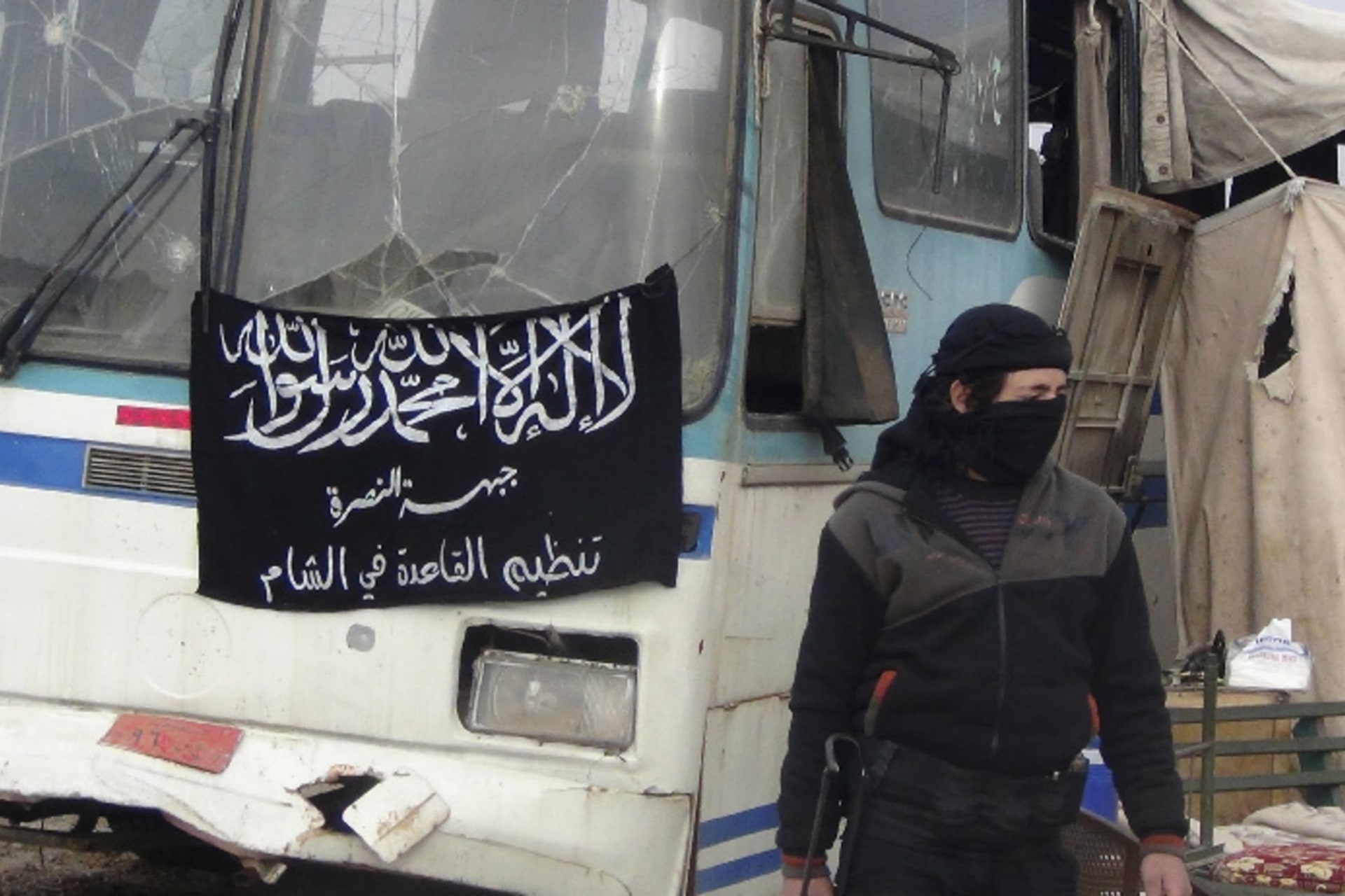 A member of Islamist Syrian rebel group Jabhat al-Nusra mans a checkpoint on the border crossing between Syria and Jordan, which they claim to have taken control of, in Daraa December 26, 2013 (Khassawneh/Courtesy Reuters).