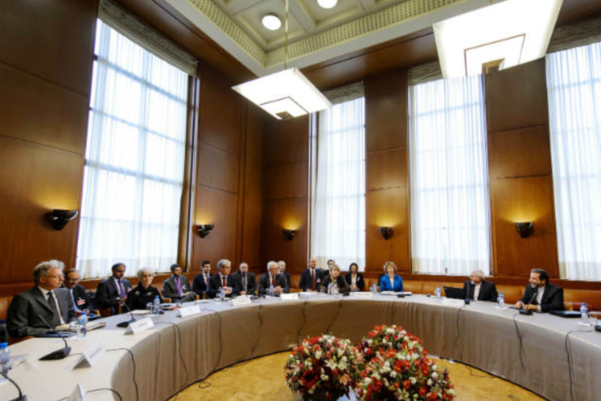 Delegations from Iran, the United States, and other world powers sit before the start of two days of closed-door nuclear talks at the United Nations offices in Geneva October 15, 2013 (Coffrini/Courtesy Reuters).