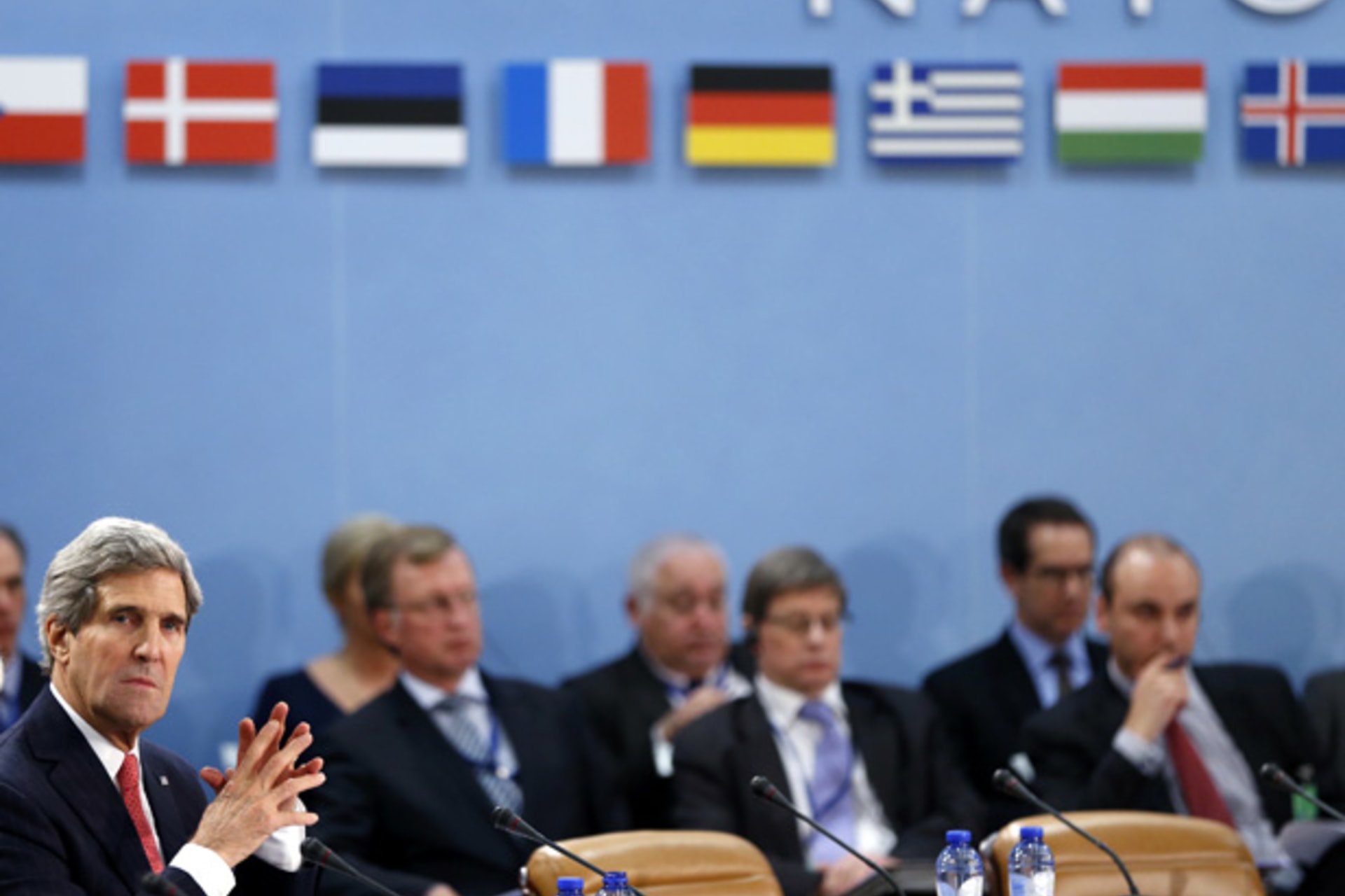 <p>U.S. secretary of state John Kerry attends a NATO foreign ministers meeting in December. (Francois Lenoir/Courtesy Reuters)</p>
