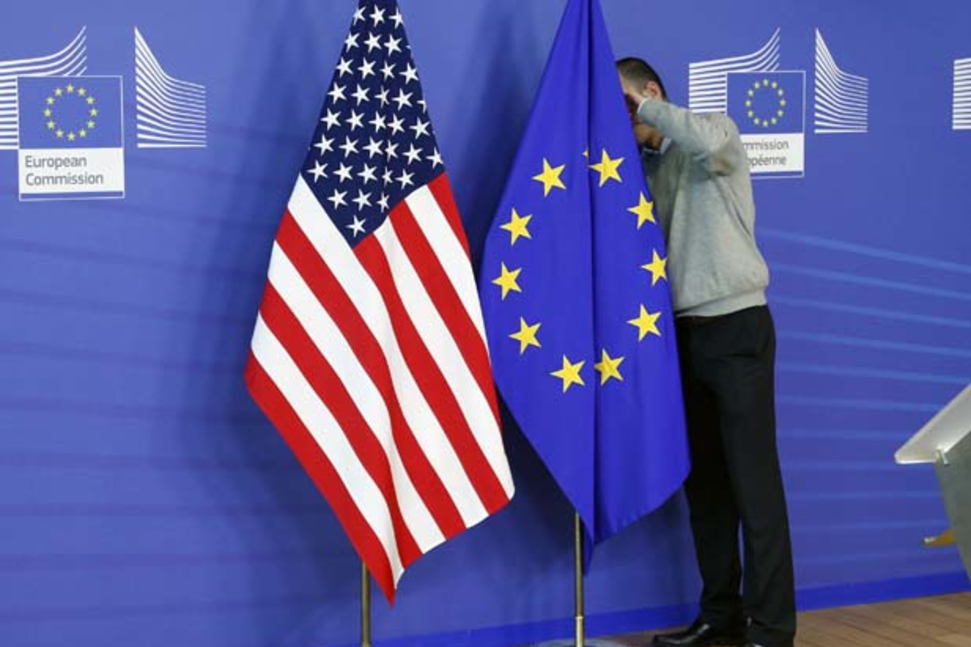 <p>U.S. and European Union flags on display at negotiations for the Transatlantic Trade and Investment Partnership in Brussels in November. (Francois Lenoir/Courtesy Reuters)</p>