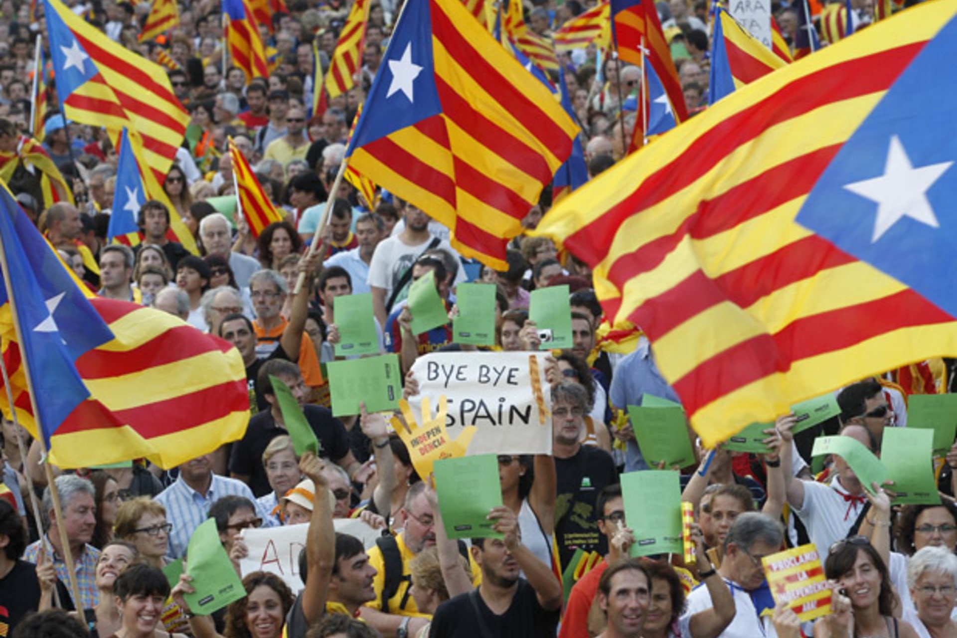 <p>Marchers wave Catalonian nationalist flags during a demonstration on Catalan National Day in Barcelona on September 11, 2012 (Albert Gea/Courtesy Reuters).</p>