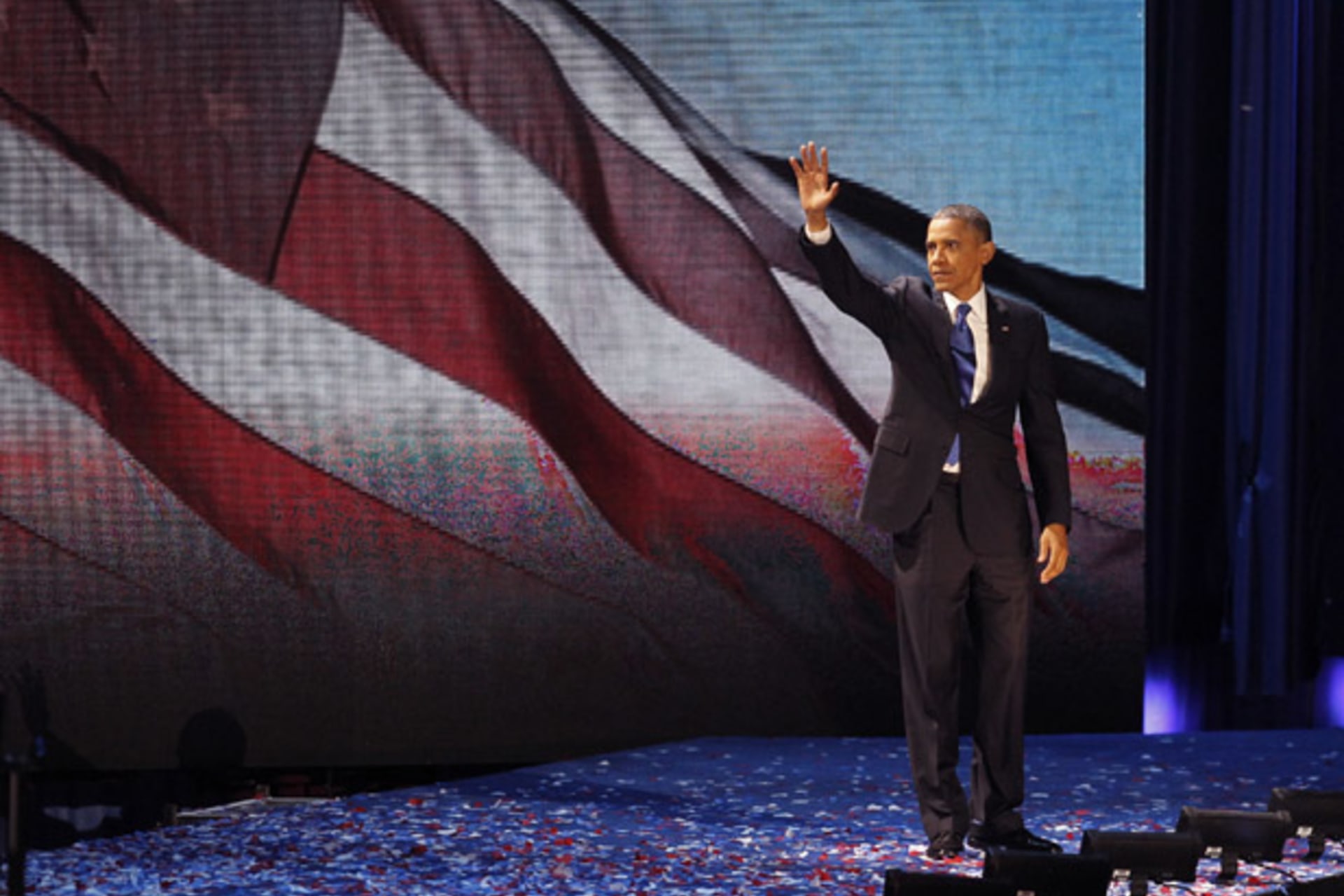 <p>President Barack Obama waves to the crowd of supporters in Chicago after winning the 2012 U.S. presidential election (Jim Bourg/Courtesy Reuters).</p>