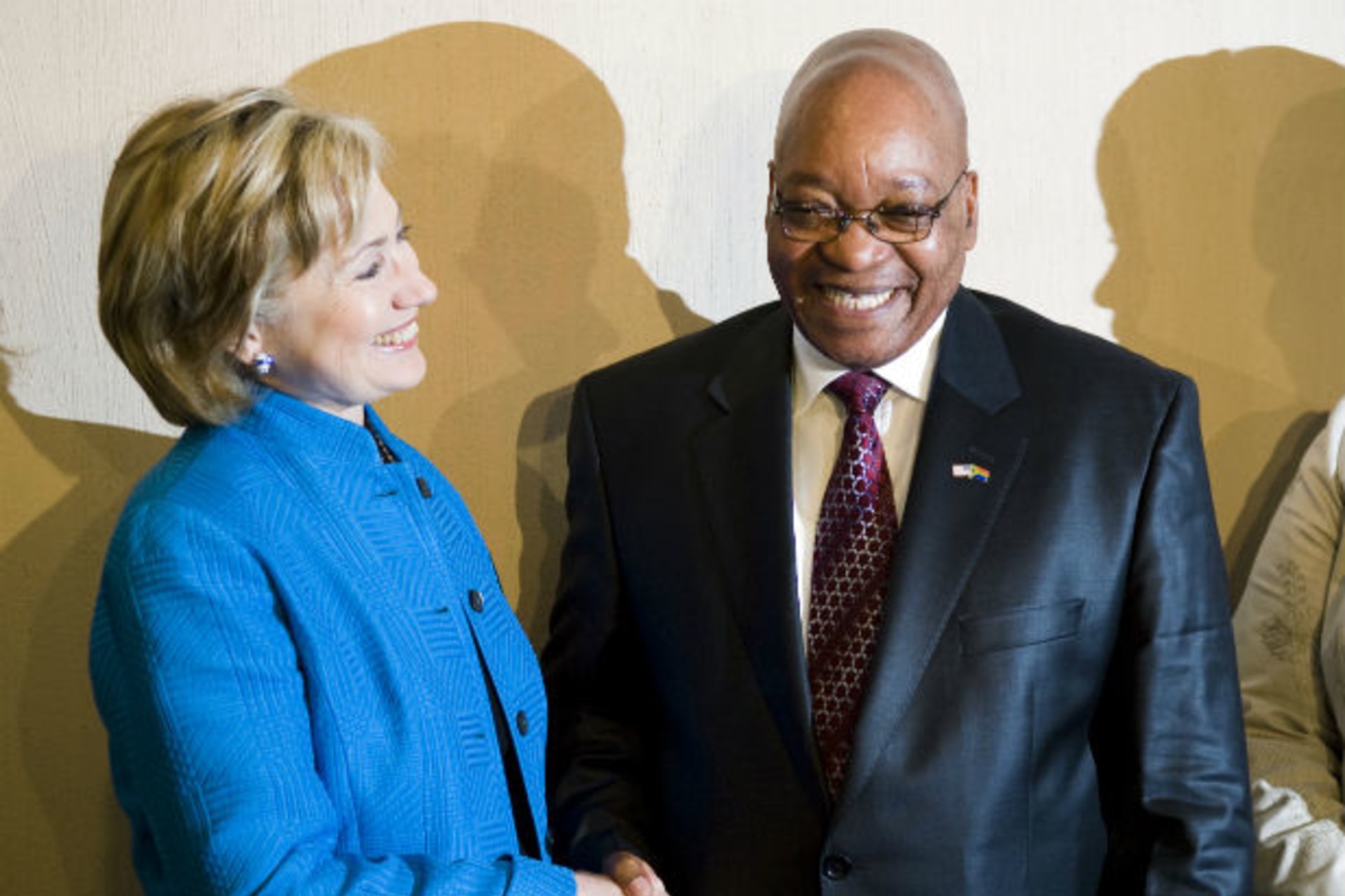 U.S. Secretary of State Hillary Clinton (L) and South Africa's President Jacob Zuma attend a photo call after a brief meeting in Durban, August 8, 2009.