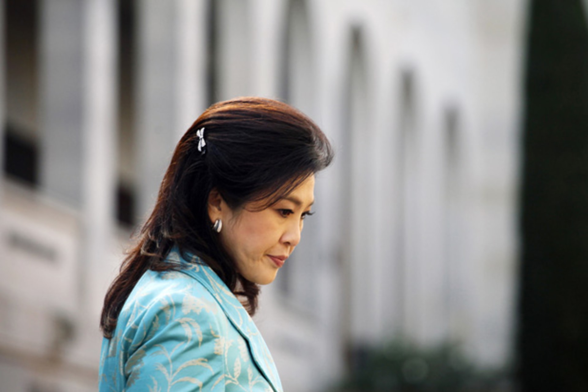 The return of many Puea Thai politicians will likely strengthen the government of Thailand's Prime Minister Yingluck Shinawatra (pictured). (Lukas Coch/Courtesy Reuters)