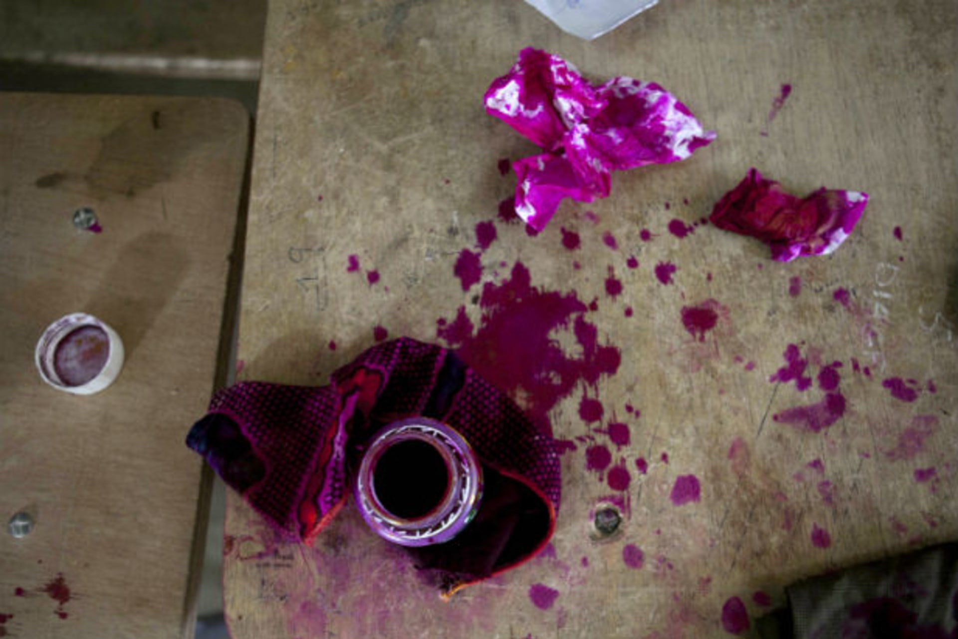 A bottle of ink used to mark voters' fingers is seen on a table during presidential elections in the capital Dakar February 26, 2012.