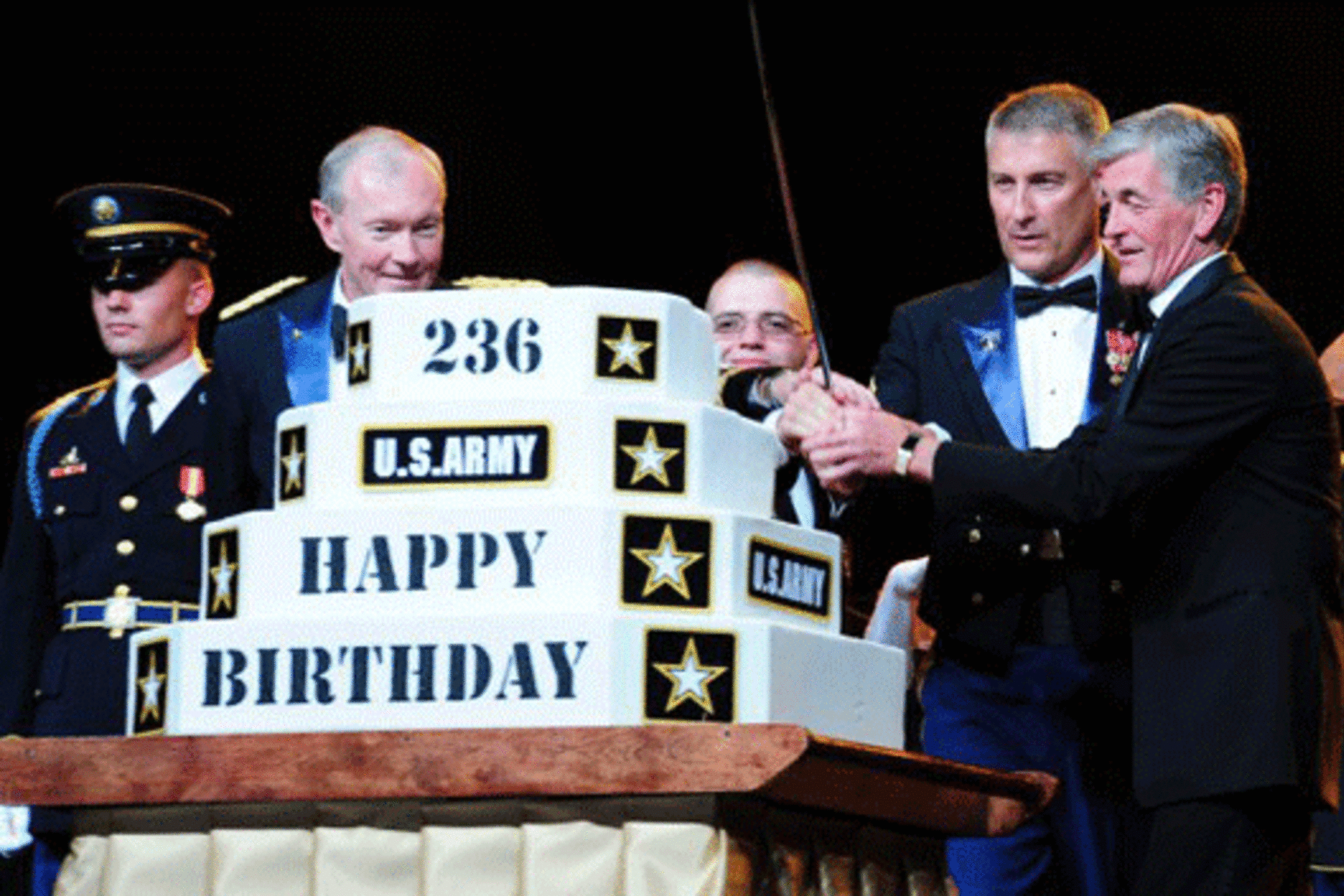 <p>Army Chief of Staff Gen. Martin Dempsey, Sergeant Major of the Army Raymond F. Chandler III, and Secretary of the Army John McHugh, prepare to cut the cake at the 236th Army Birthday Ball on June 11, 2011. </p>

