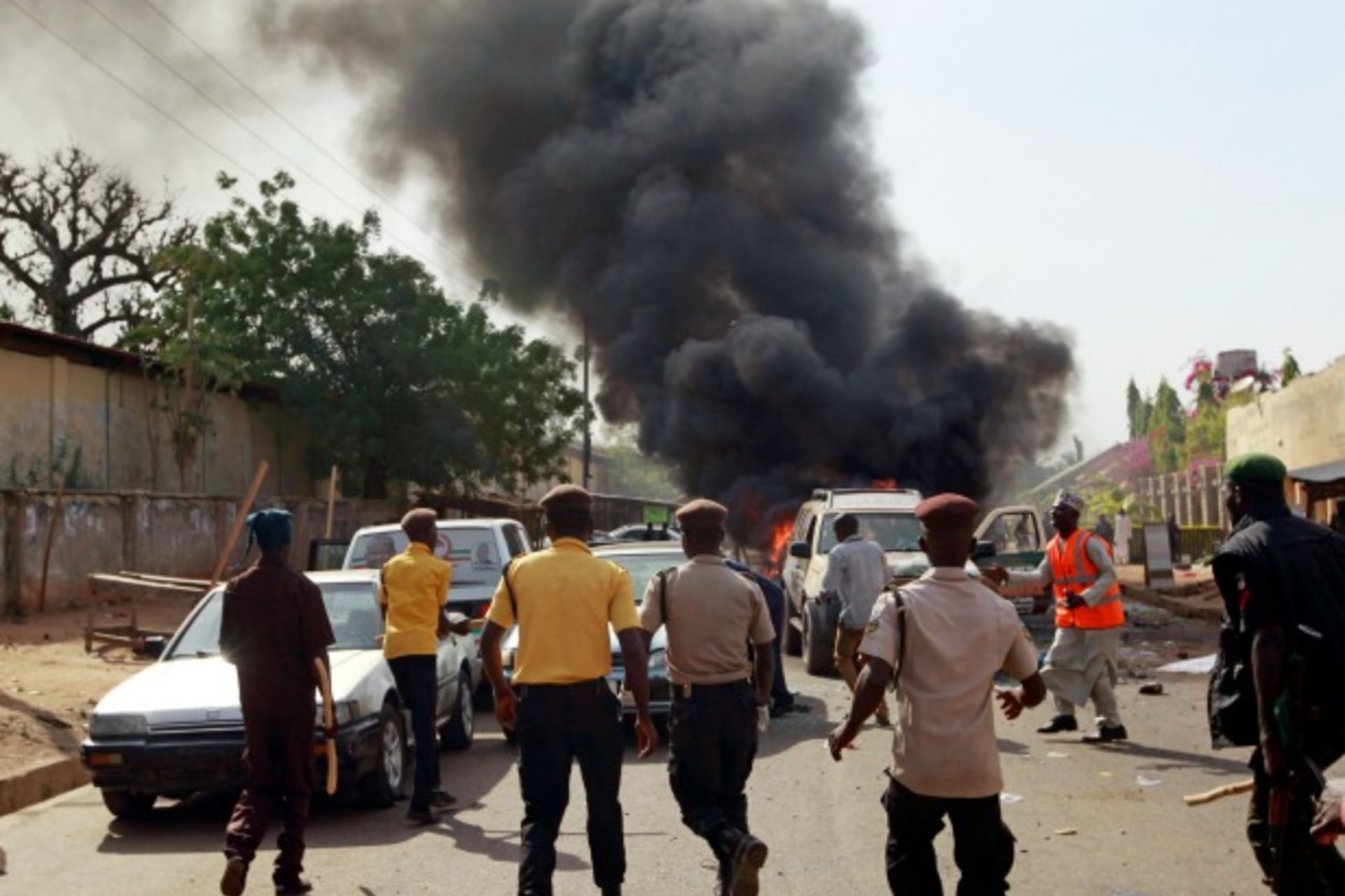 Security Personnel Rush towards a car bomb
