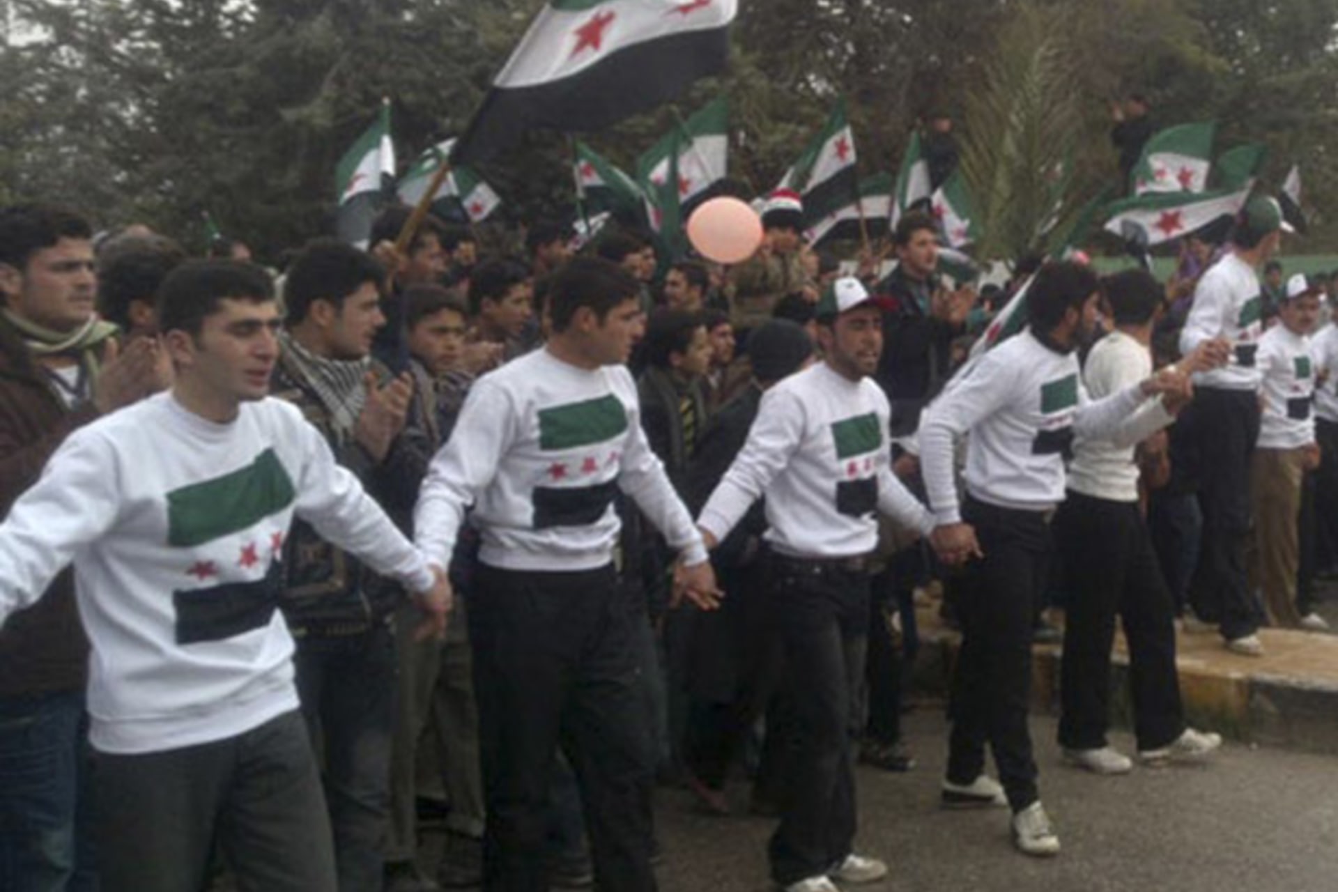 Demonstrators protest against Syria's President Bashar al-Assad after their Friday prayers in Kafranbel