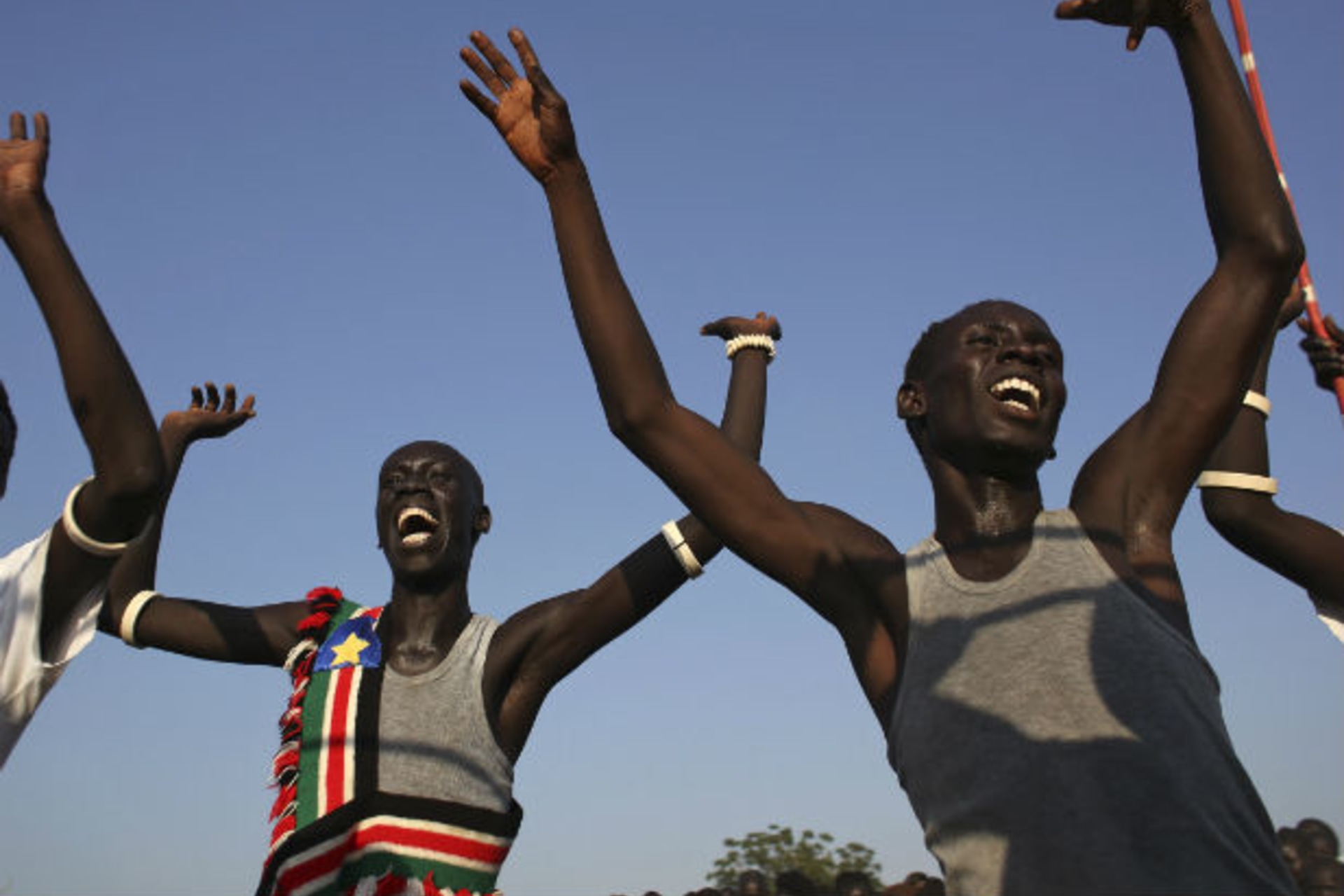 Men sing and dance as they celebrate referendum results in Abyei October 31, 2013.