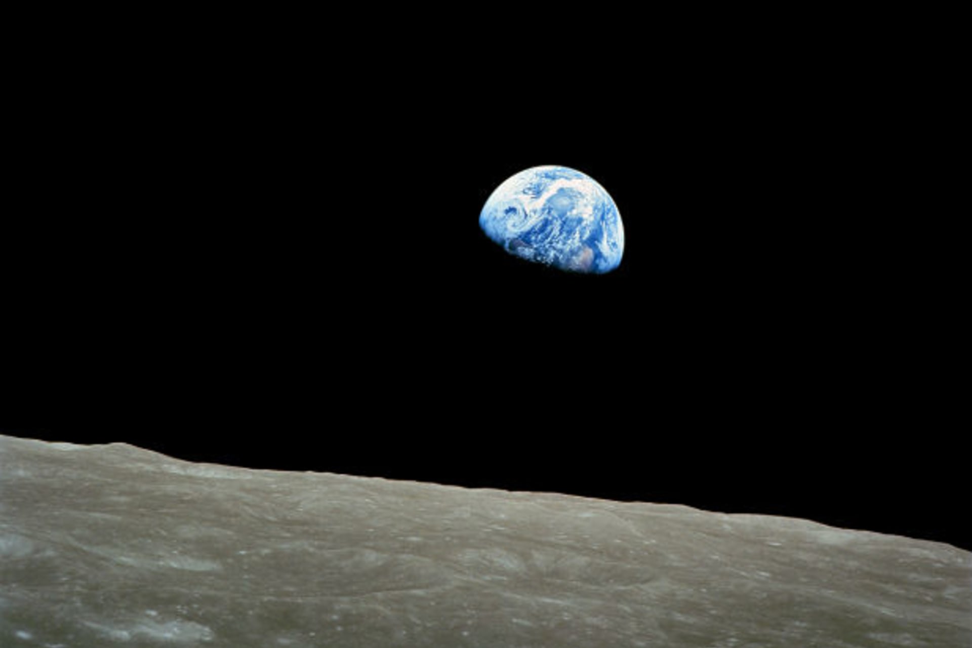 <p>A photo of Earth—dubbed “Earthrise”—taken by U.S. astronaut William Anders during the Apollo 8 mission in December 1968.</p>