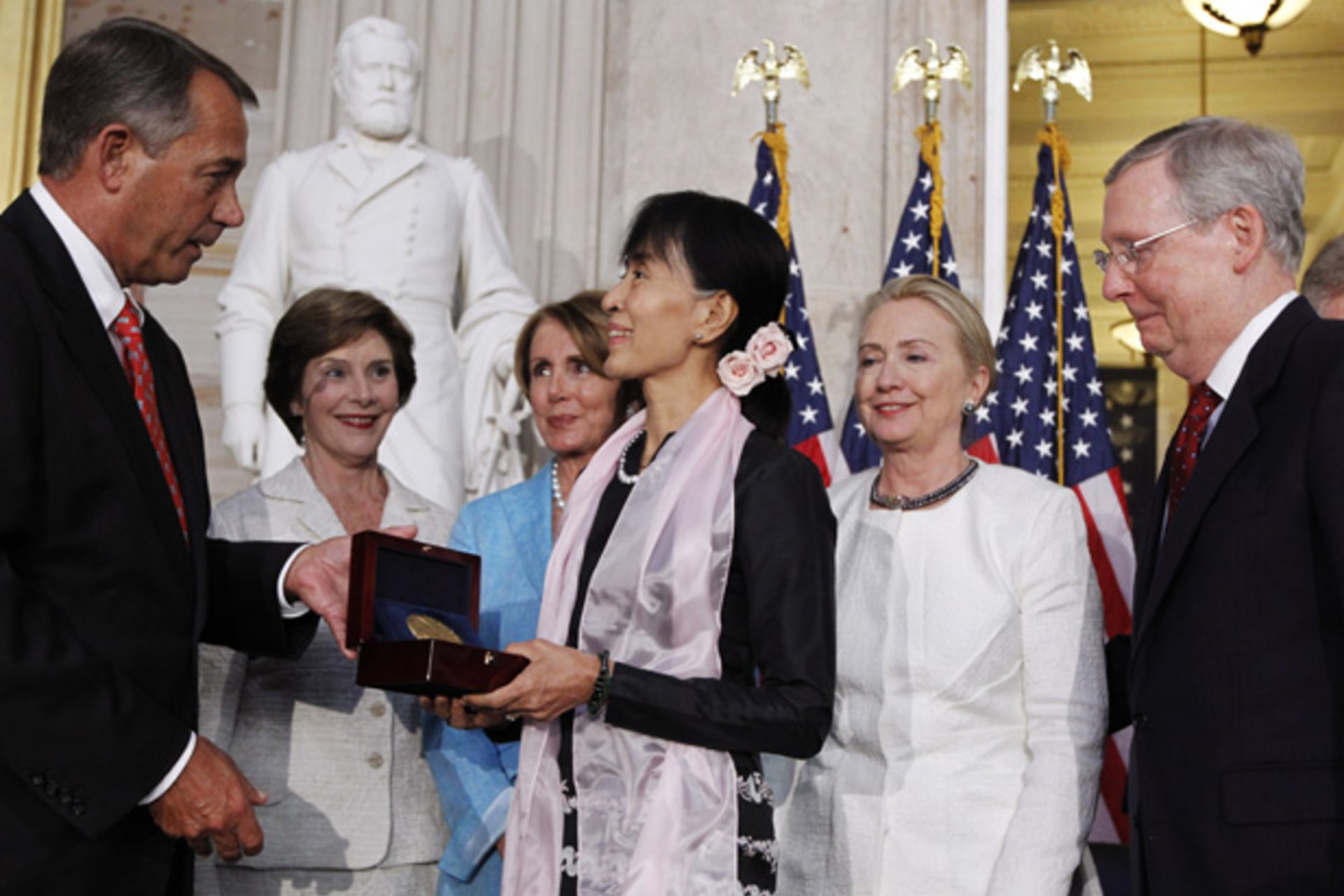 <p>Myanmar opposition leader Suu Kyi is presented with the Congressional Gold Medal by House Speaker Boehner in Washington.</p>
