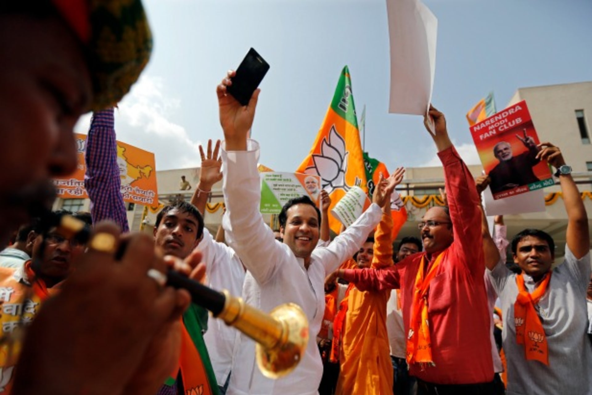<p>Supporters of India’s Bharatiya Janata Party (BJP) celebrate on March 16, 2014, after learning of poll results showing Narendra Modi of the BJP as the next leader of the world’s largest democracy (Amit Dave/Courtesy Reuters).</p>
