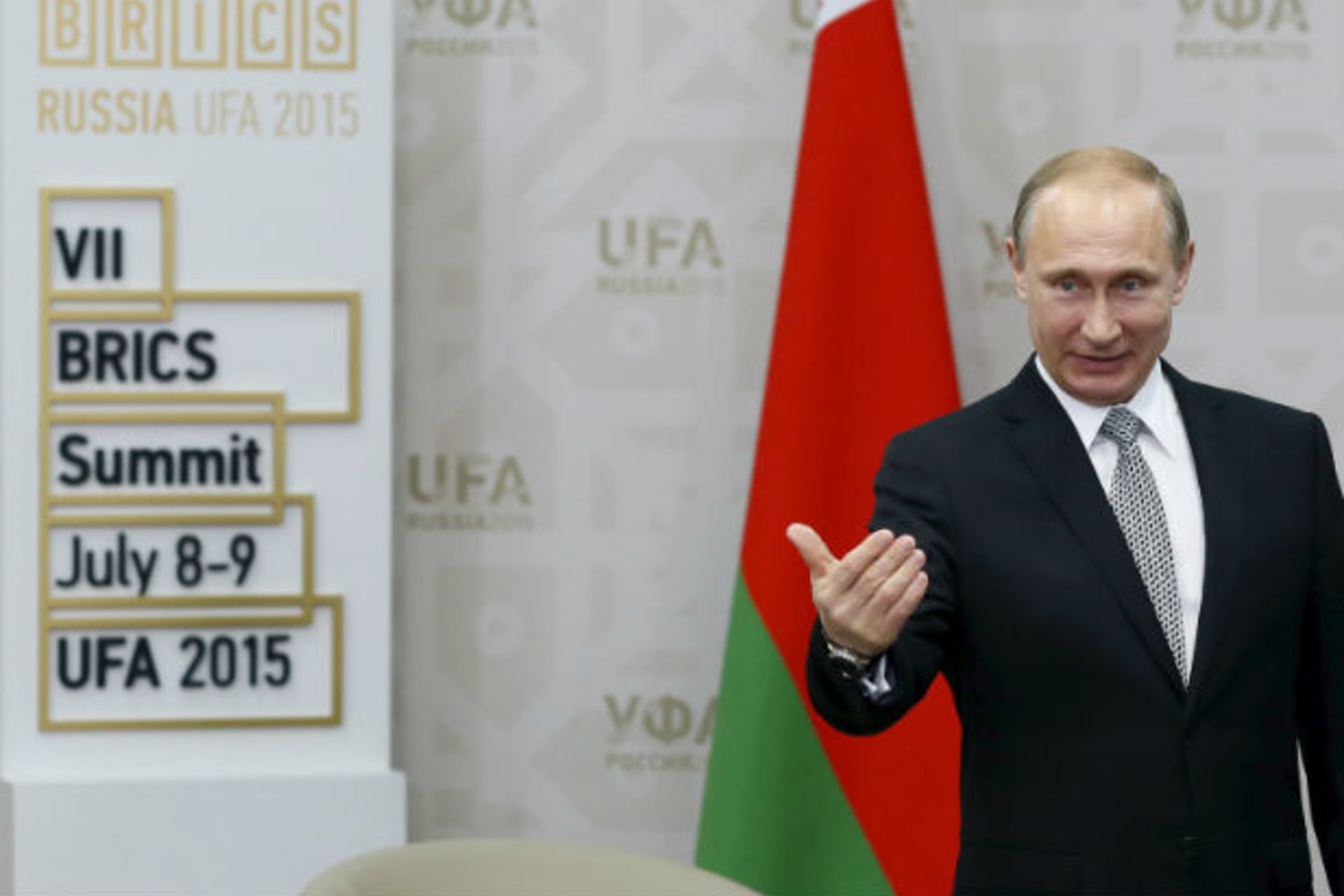 <p>Russian President Vladimir Putin gestures during a meeting ahead of the BRICS summit in Ufa, Russia, on July 8, 2015.</p>
