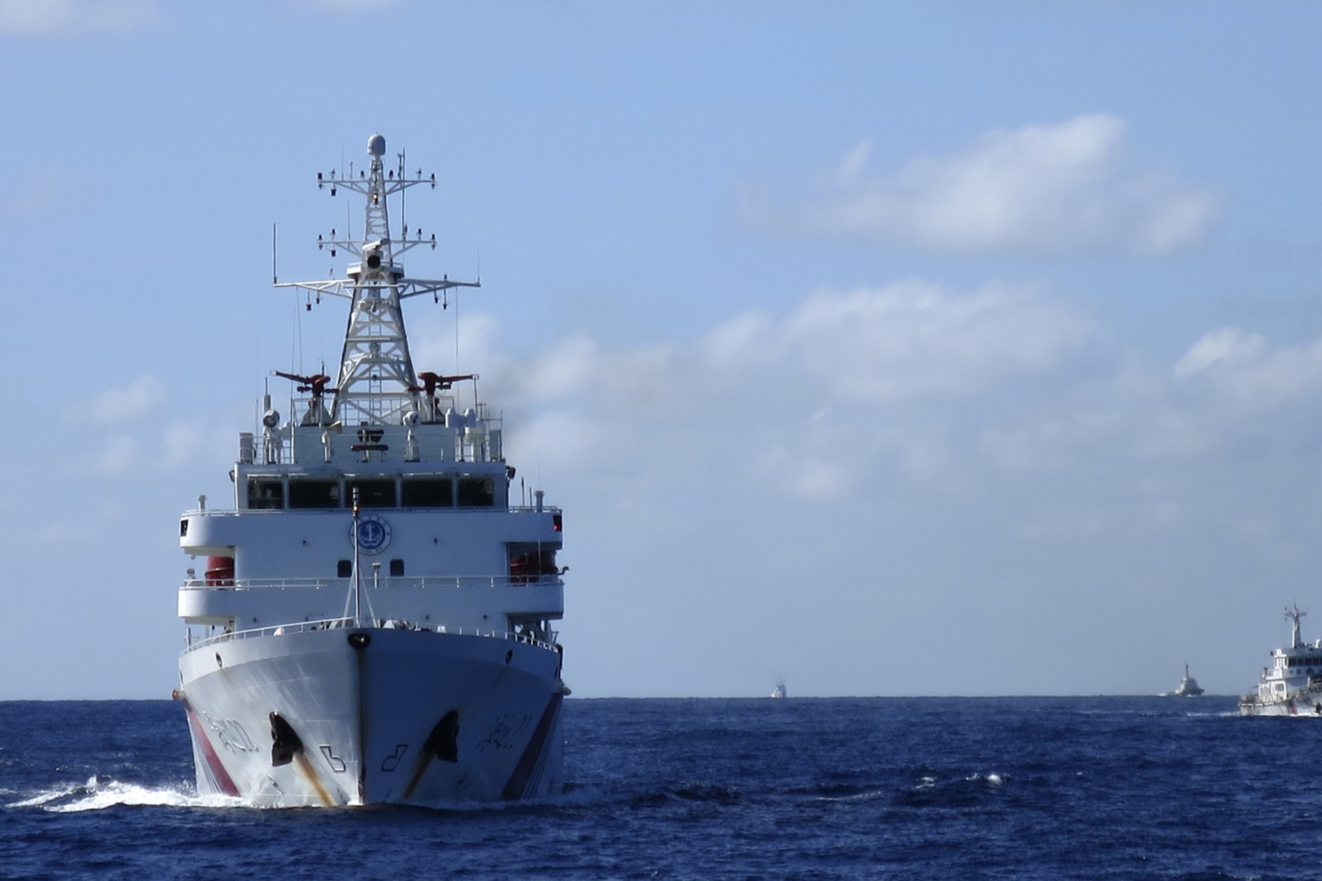 <p>Chinese coastguard ships give chase to Vietnamese coastguard vessels (not pictured) after they came within 10 nautical miles of the Haiyang Shiyou 981, known in Vietnam as HD-981, oil rig in the South China Sea on July 15, 2014.</p>