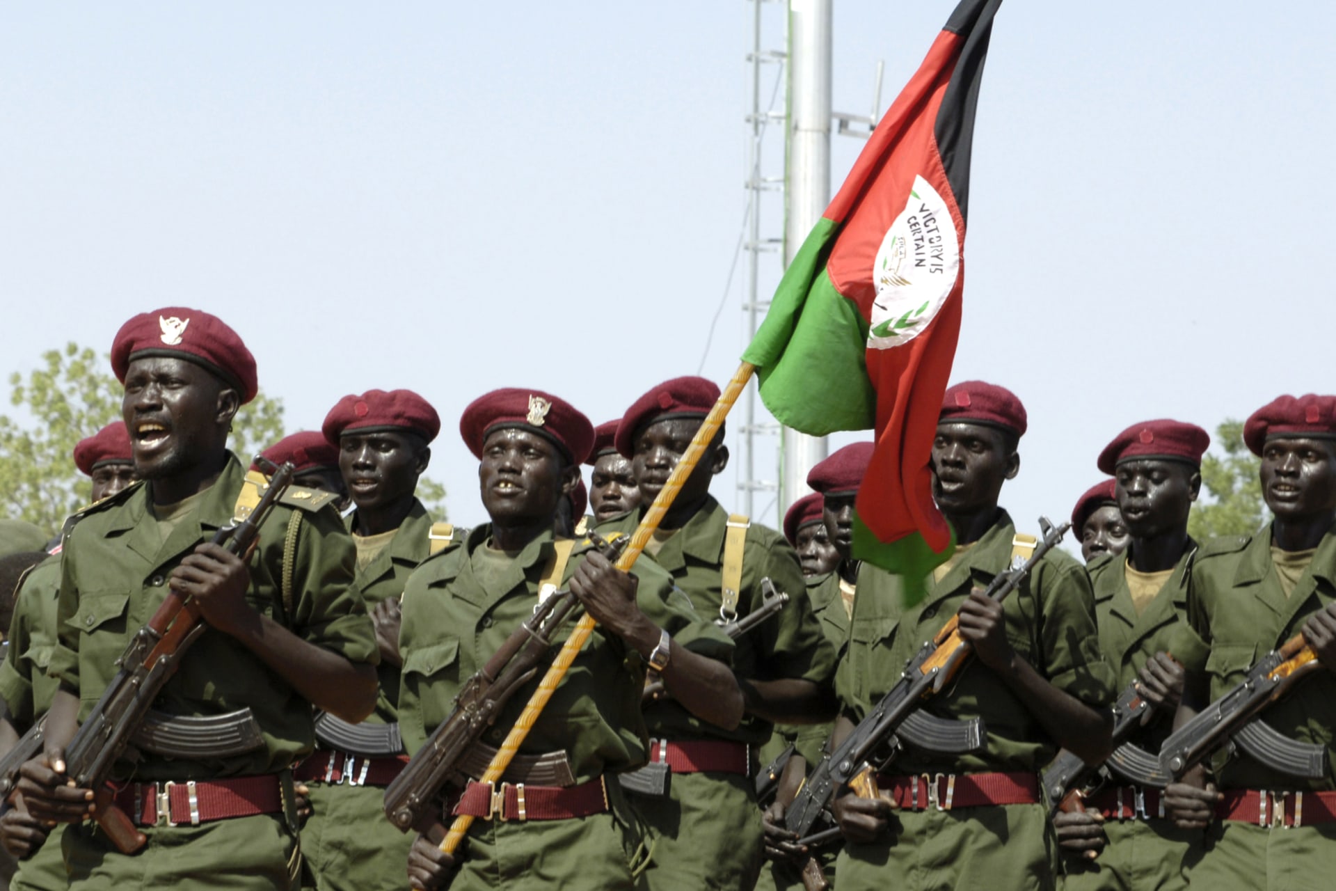 <p>Sudan People’s Liberation Movement (SPLM) soldiers march during a parade at the 4th anniversary celebration of the signing of the Comprehensive Peace Agreement, ending more than two decades of civil war in the southern town of Malakal on January 9, 2009.</p>
