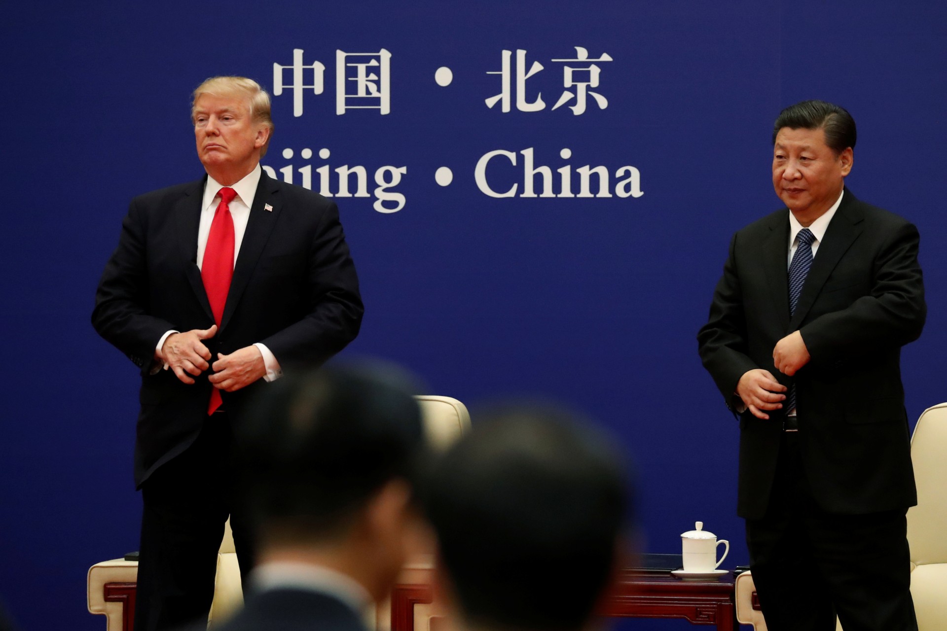 <p>China’s President Xi Jinping and U.S. President Donald Trump address business leaders at the Great Hall of the People in Beijing on November 9, 2017.</p>
