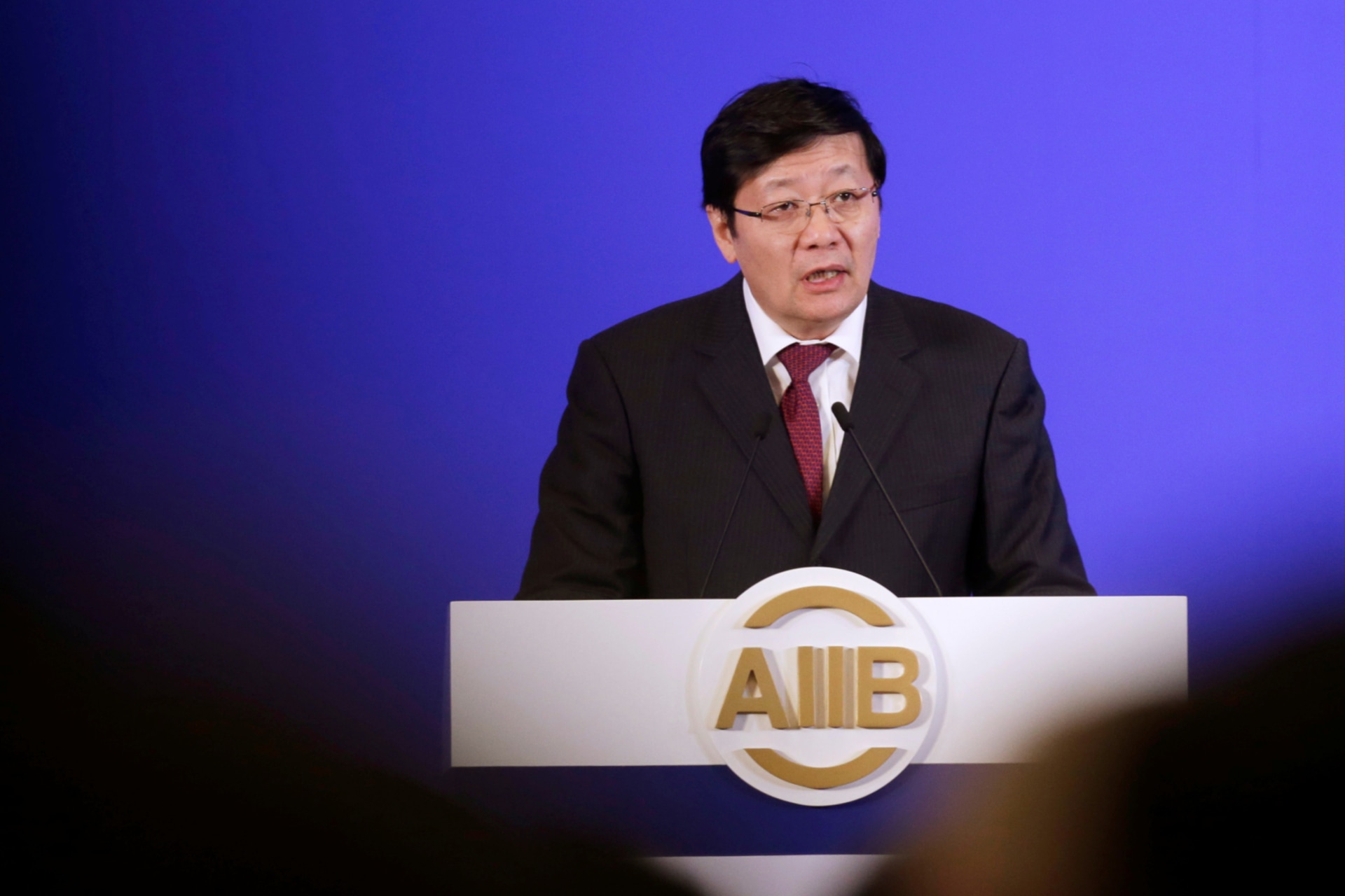 <p>Chinese Finance Minister Lou Jiwei attends the opening ceremony of the first annual meeting of Asian Infrastructure Investment Bank (AIIB) in Beijing, China, on June 25, 2016.</p>
