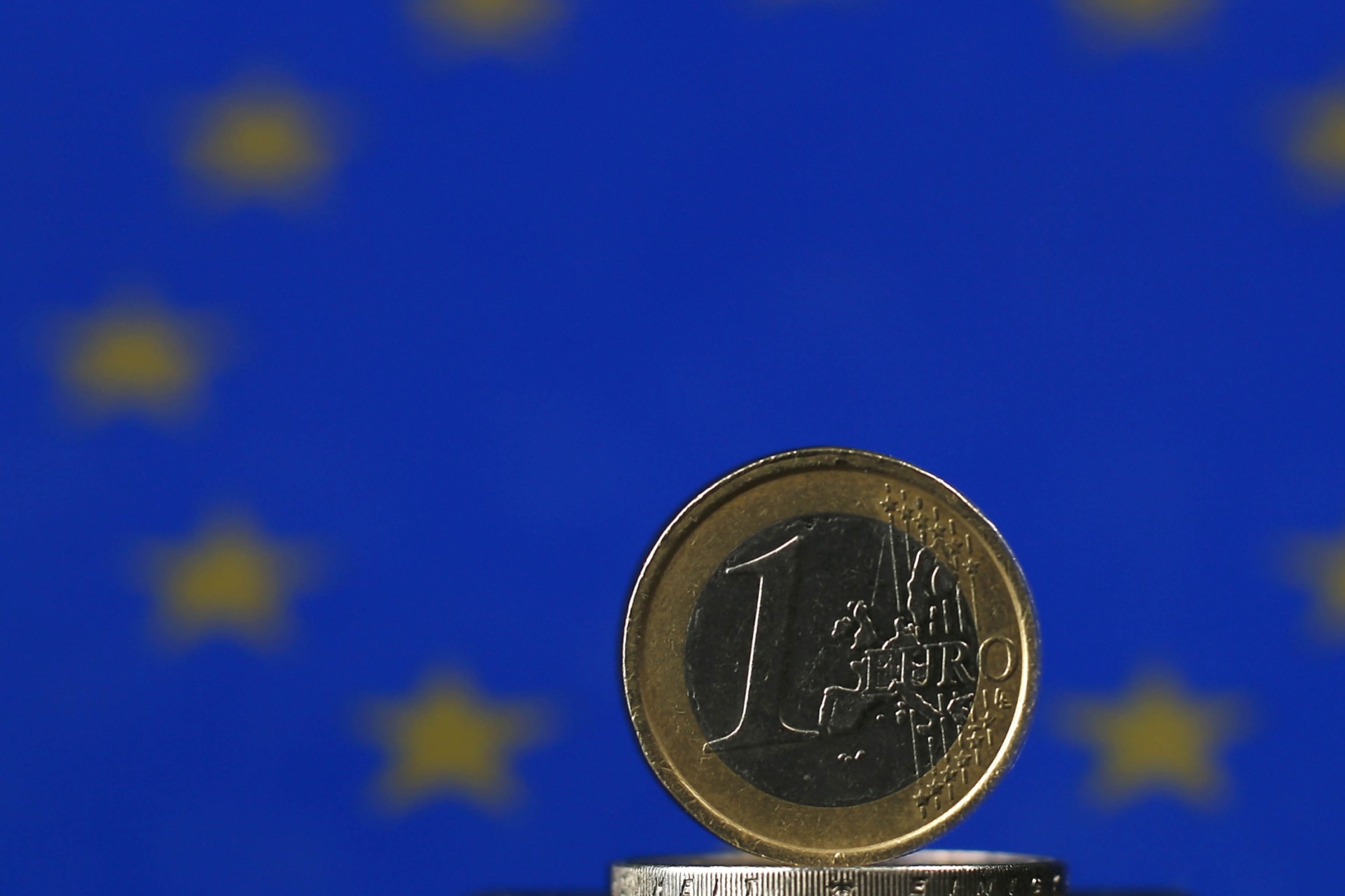 <p>An illustration picture shows Euro coins, photographed in Warngau on April 3, 2013.</p>
