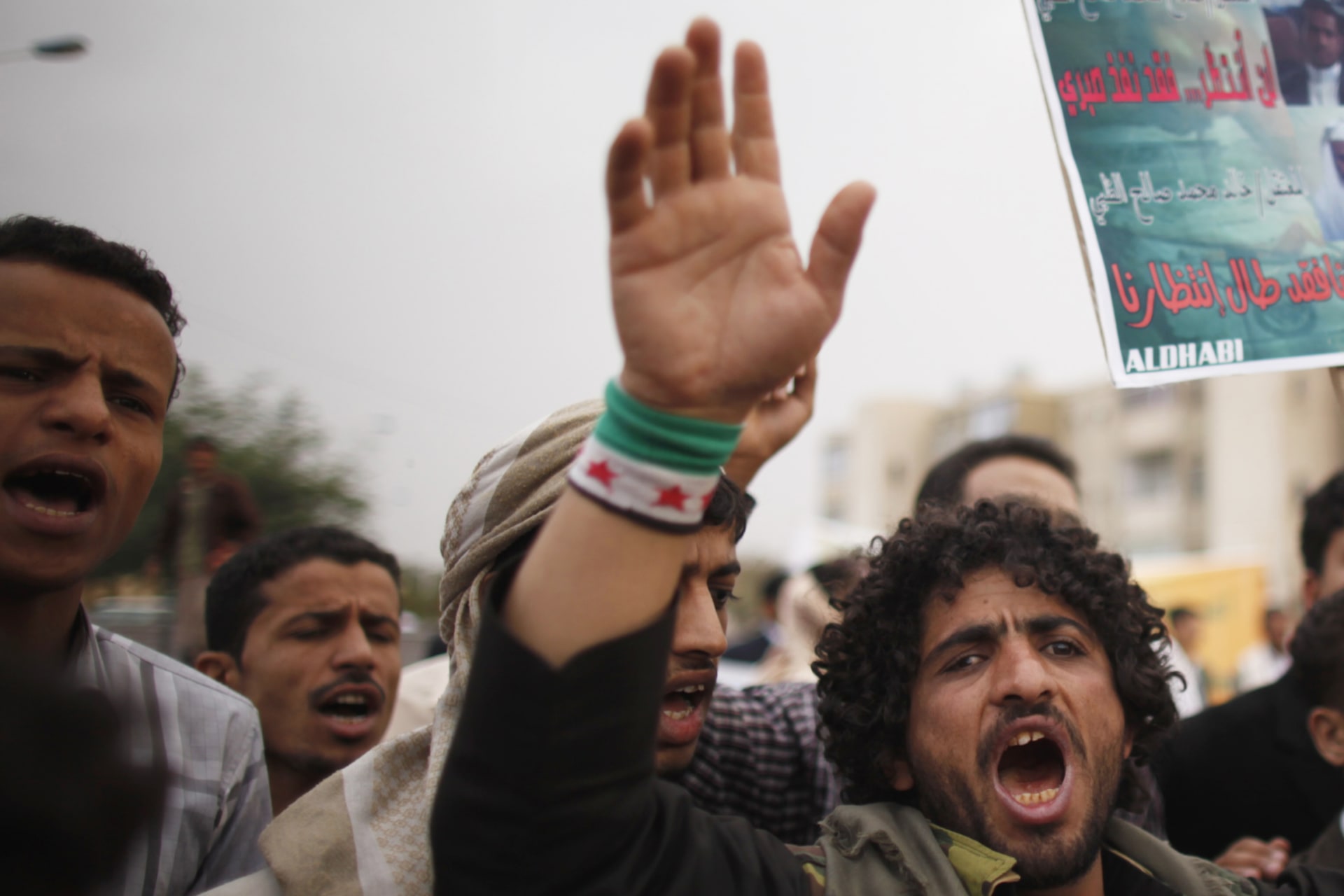 <p>Relatives of Yemeni detainees at Guantanamo Bay prison shout slogans, during a protest demanding the release of the detainees, outside the U.S. embassy in Sanaa on July 21, 2013.</p>