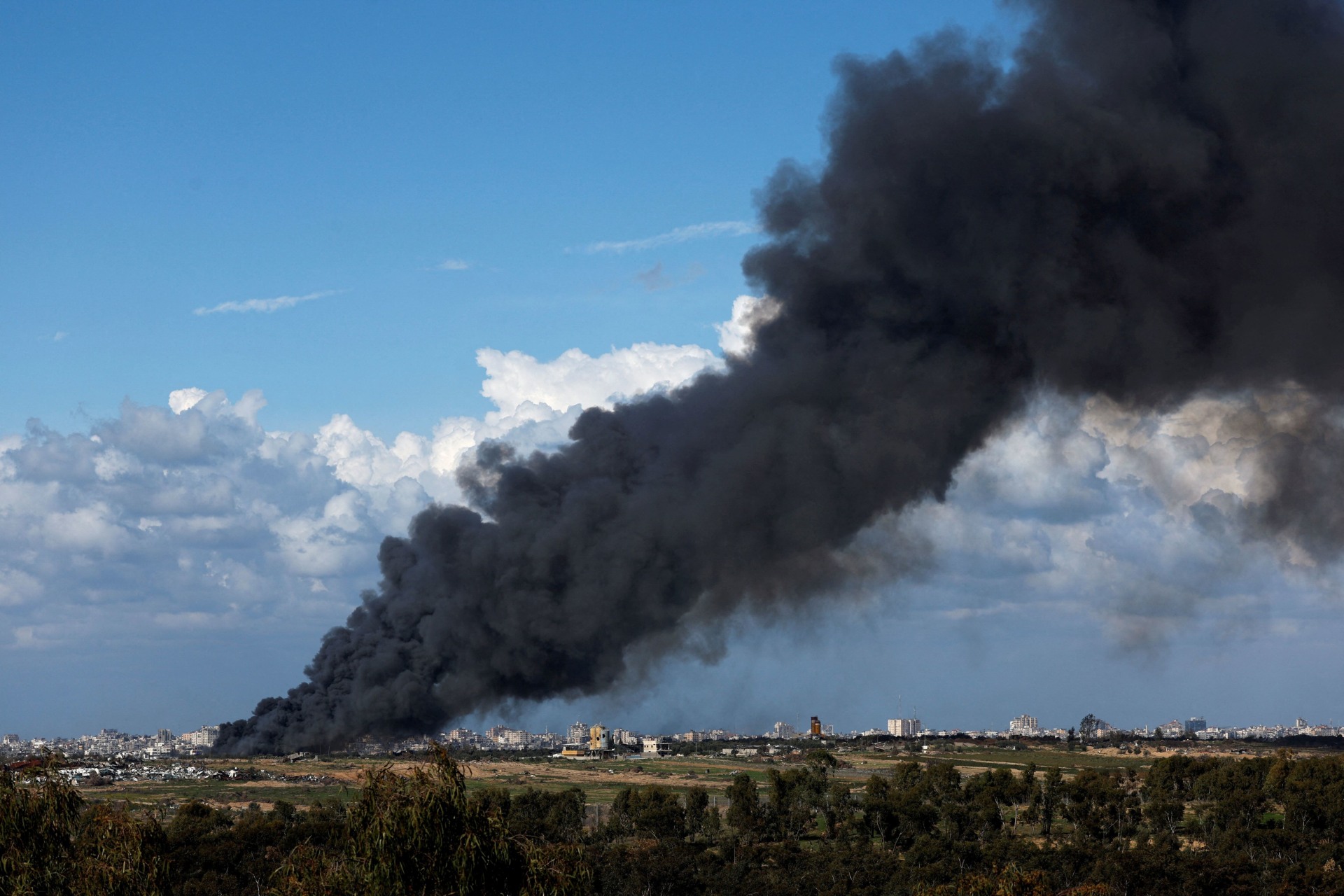 <p>Smoke rises above North Gaza</p>
