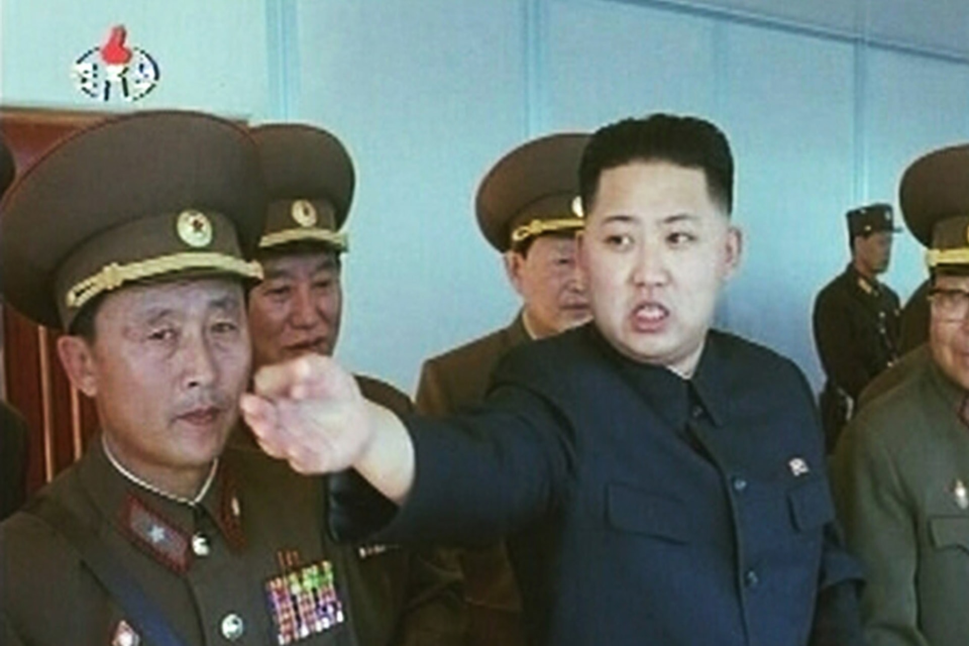 <p>New leader of North Korea Kim Jong-un speaks while surrounded by soldiers in this undated still image taken from video at an unknown location in North Korea released by North Korean state TV KRT on January 8, 2012.</p>
