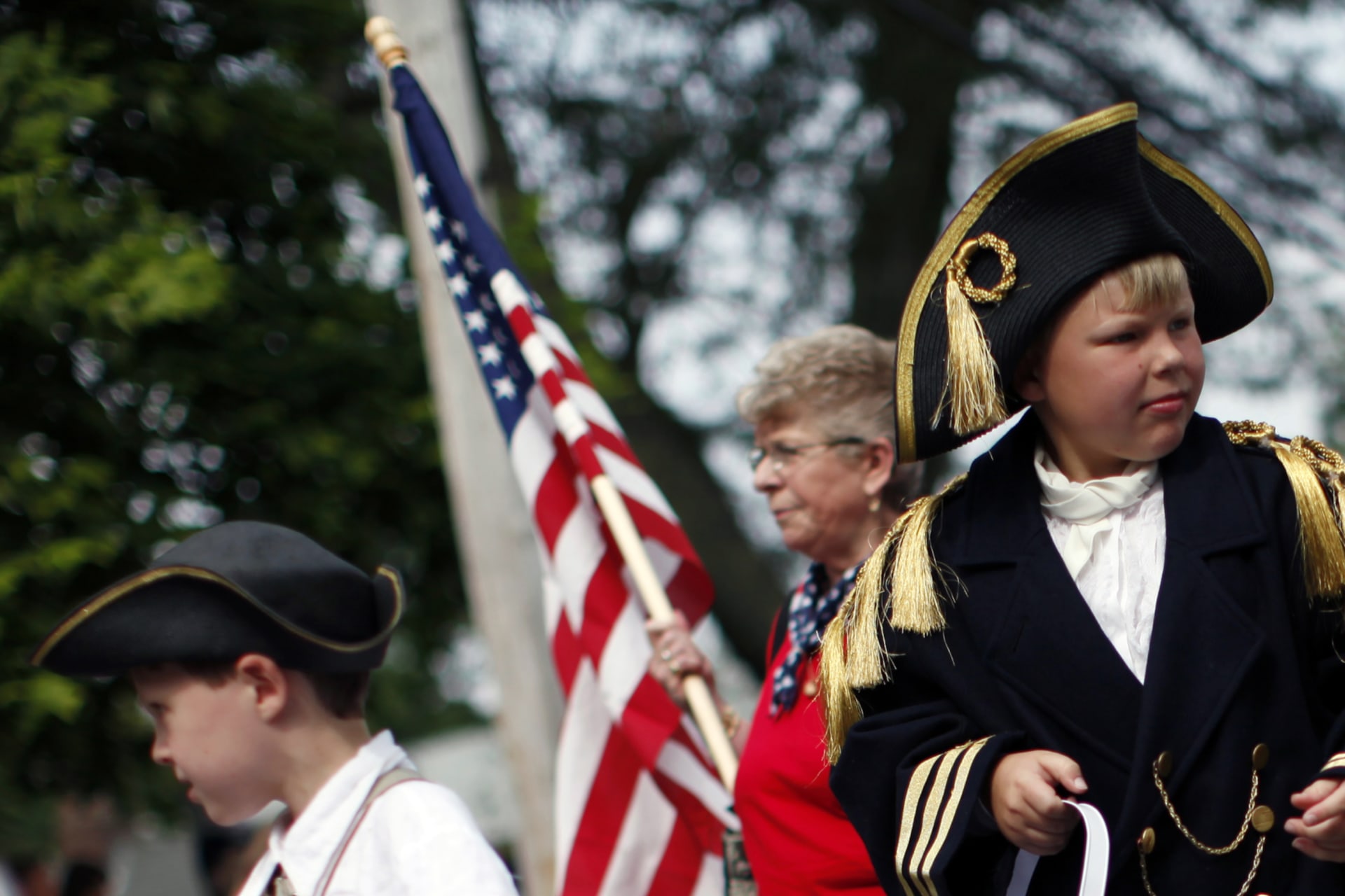 <p>Children and adults march in the Barnstable Fourth of July parade, in Barnstable Village, one of America’s oldest settled towns founded in 1639 on Cape Cod, Massachusetts, on July 4, 2011.</p>
