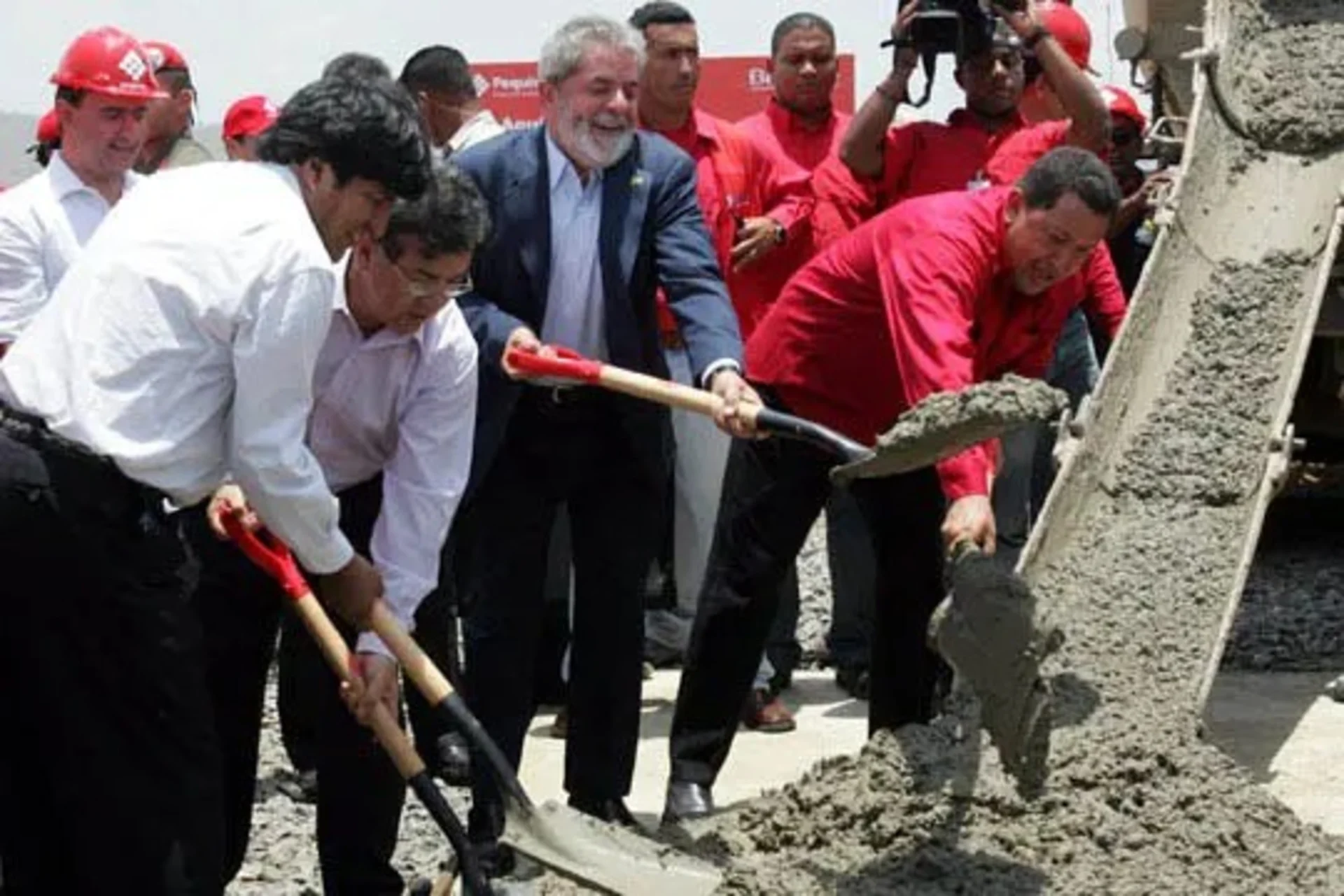 The Bolivian and Brazilian presidents and Chavez at a plant opening.