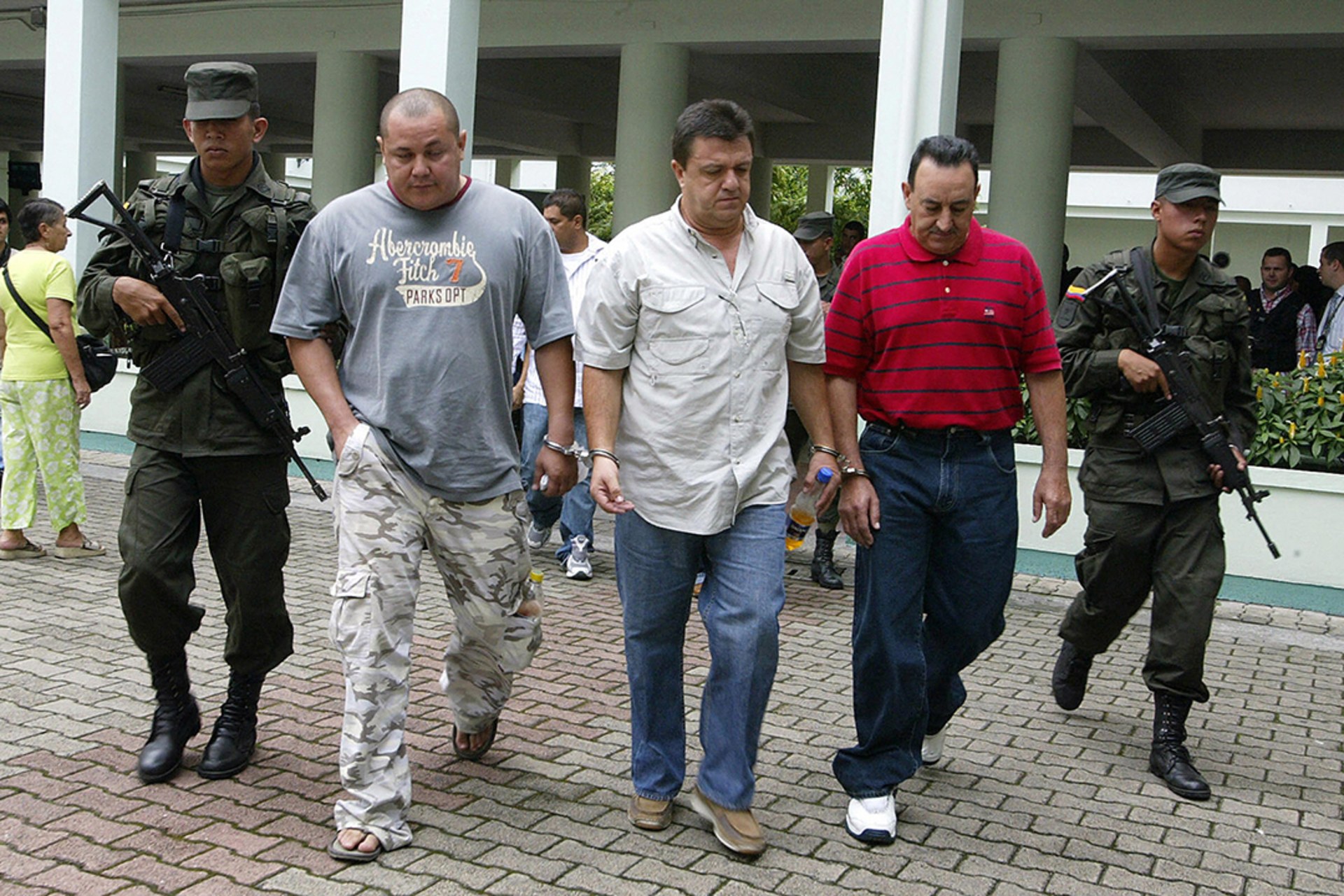 Colombian police arrest three men wanted for extradition by the United States on suspicion of heroin trafficking in 2007. Gerardo Gomez/AFP/Getty Images