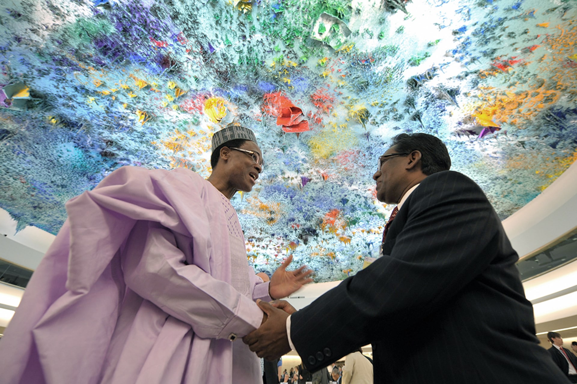 President of the UNHRC Martin Ihoeghian Uhomoibhi (left) welcomes Vice President of the Maldives Mohamed Waheed (right) at the opening of the 10th UNHRC in Geneva, March 2, 2009. Fabrice Coffrini/AFP/Getty Images