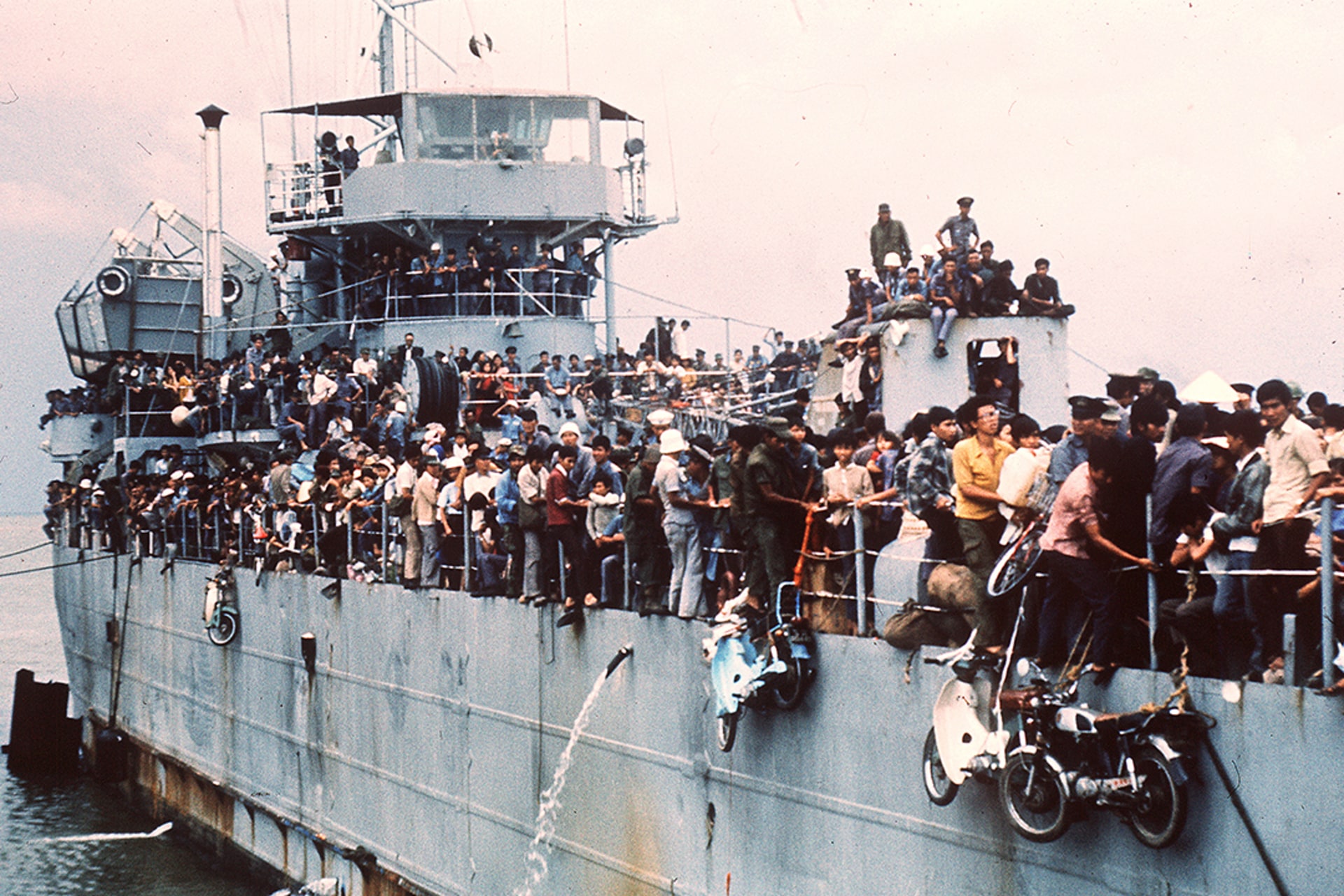 More than seven thousand refugees on a South Vietnamese Navy ship arrive at Vung Tau port in South Vietnam. AFP/Getty Images