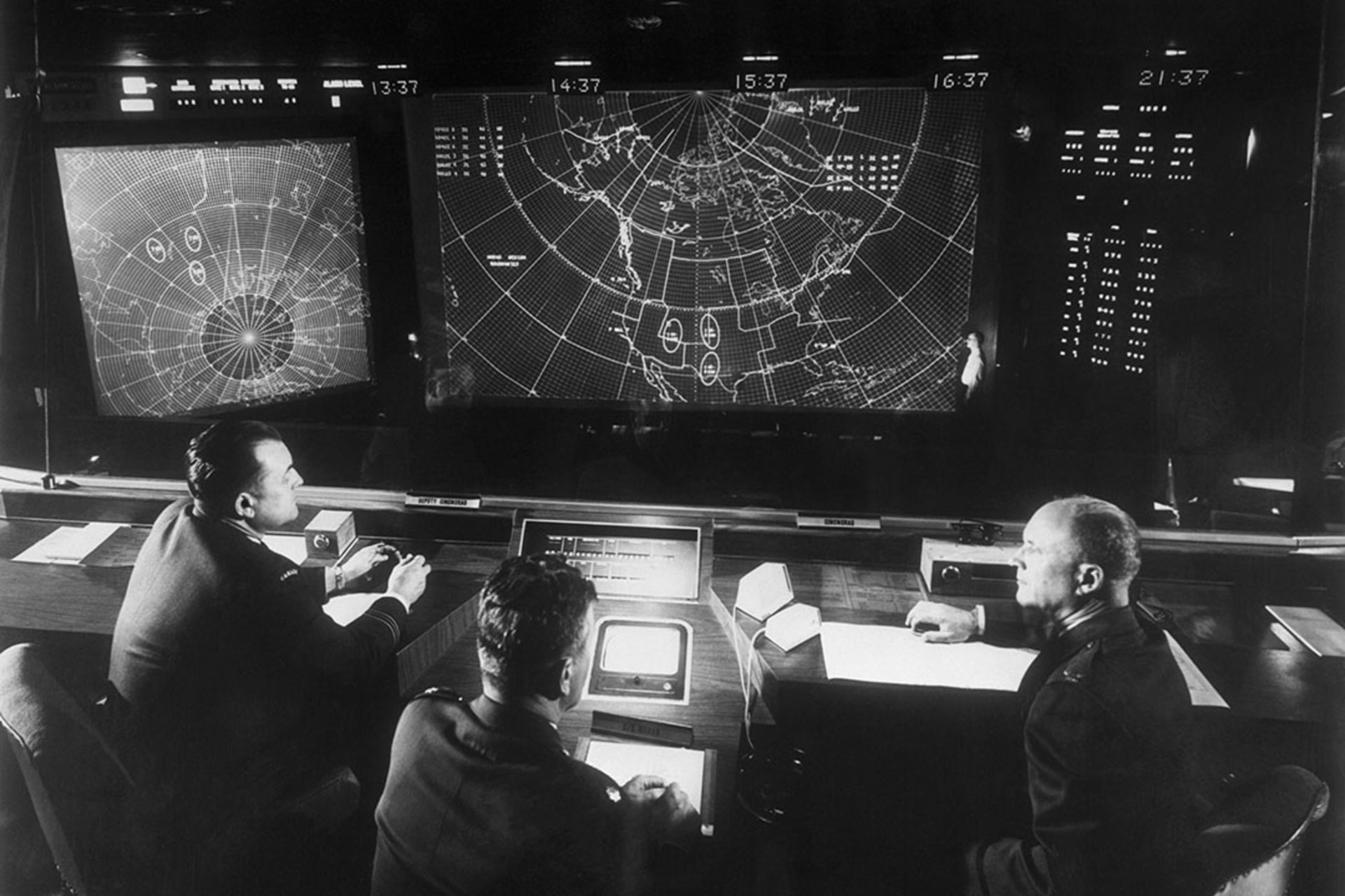 Observers in the Combat Operations Center at NORAD headquarters in Colorado Springs, Colorado, monitor the positions of airborne objects thousands of miles away. Bettmann/Getty Images