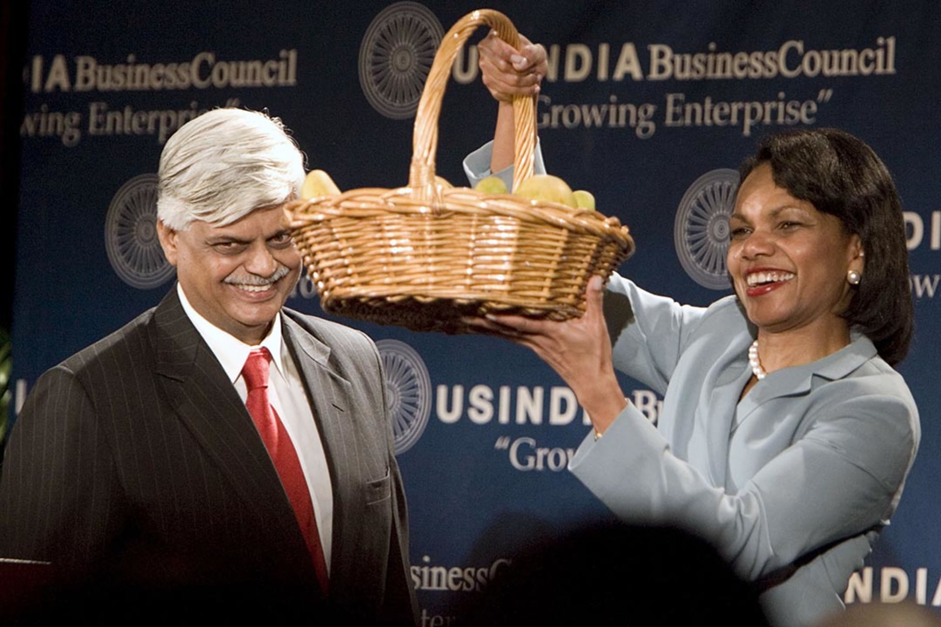 Secretary Rice holds a basket of mangoes given to her by an Indian official in June 2007. Joshua Roberts/Reuters