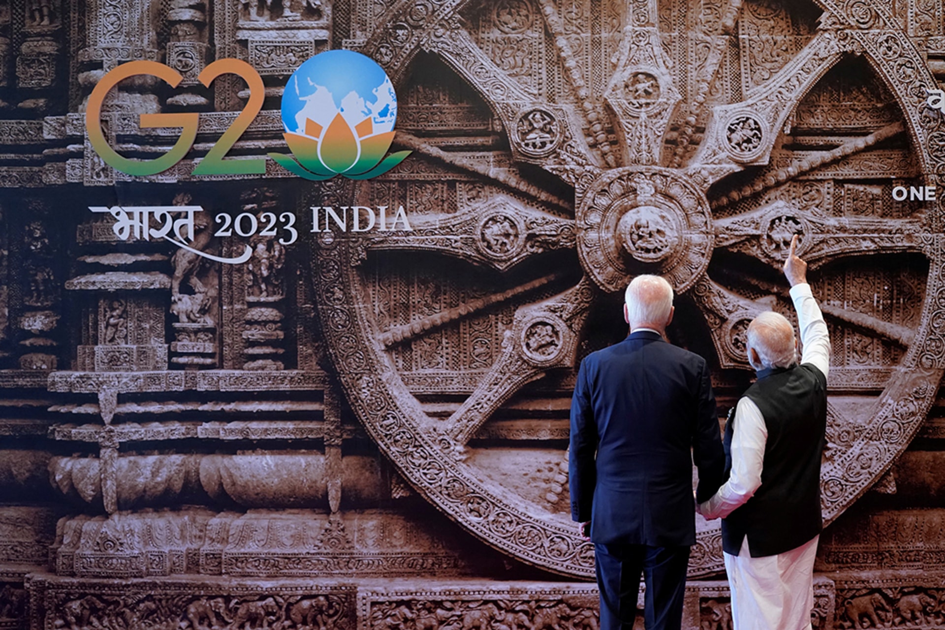 Prime Minister Modi shows President Biden a mural upon his arrival in New Delhi, India, for the G20 Summit, September 9, 2023. Evan Vucci/Reuters