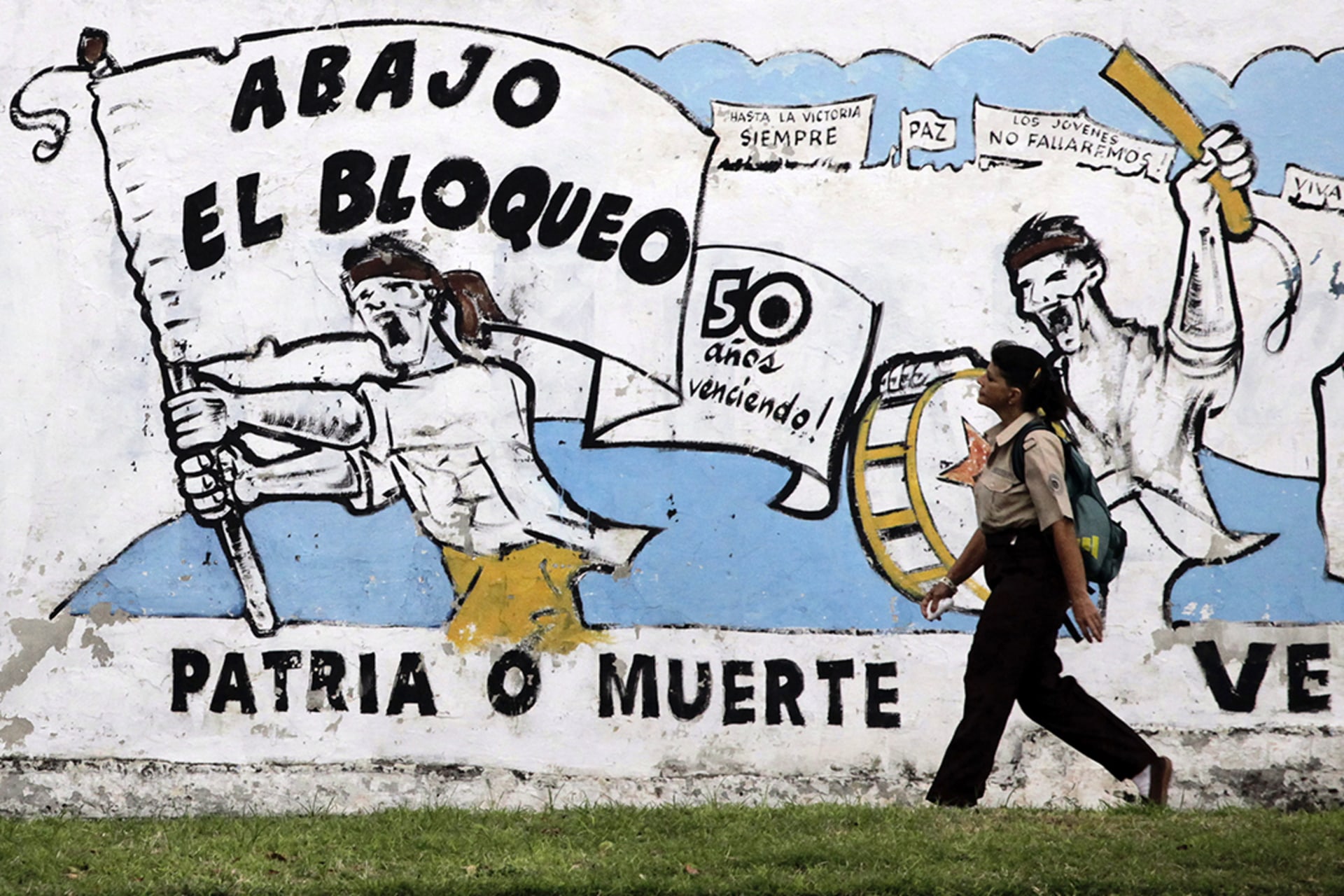 A mural in Havana reads, "Down with the blockade," referring to the fifty-year U.S. embargo. 
