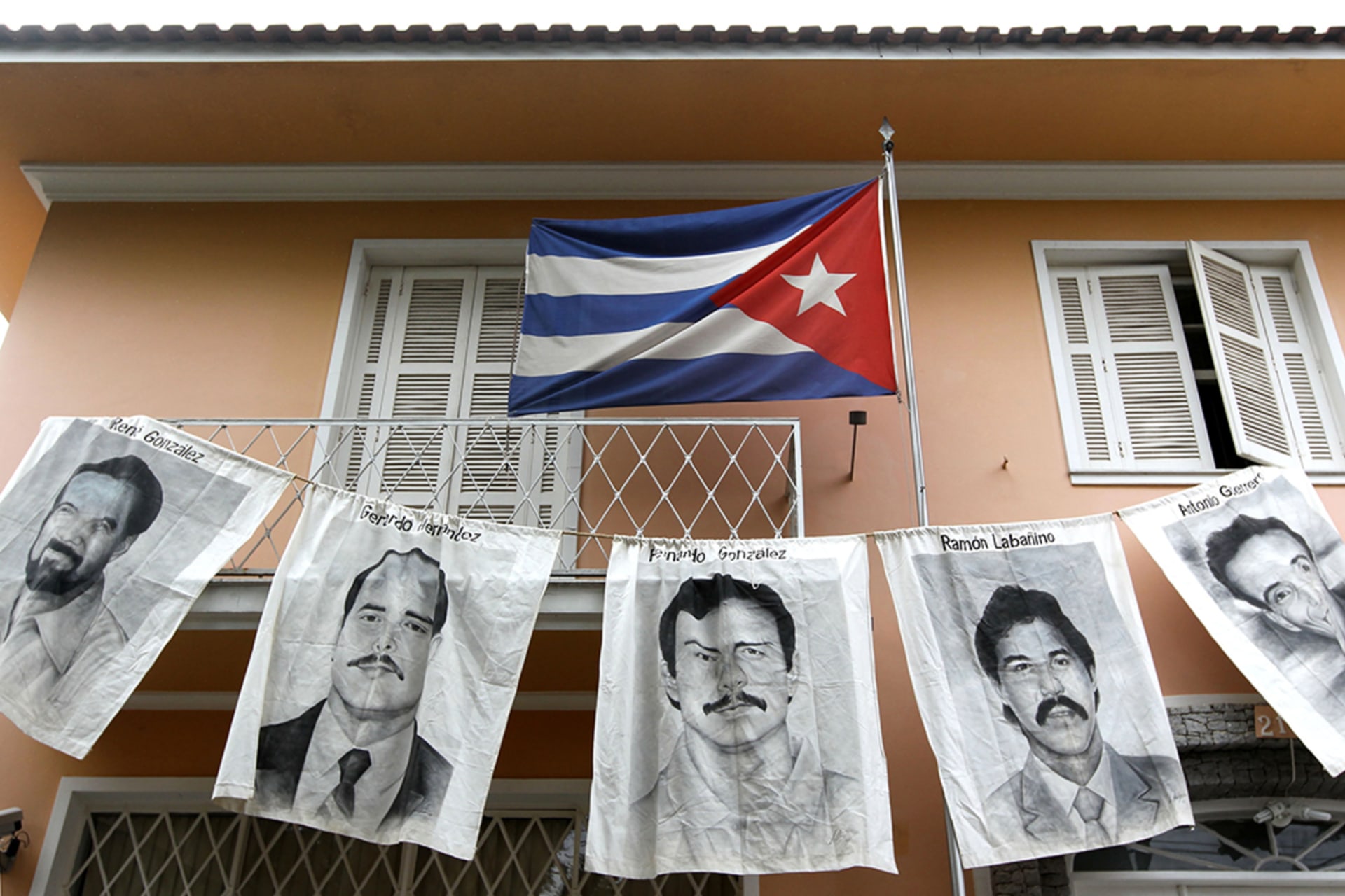 Posters of the five Cubans who were jailed in the United States are displayed in front of the Cuban Consulate in Sao Paulo, Brazil. 
