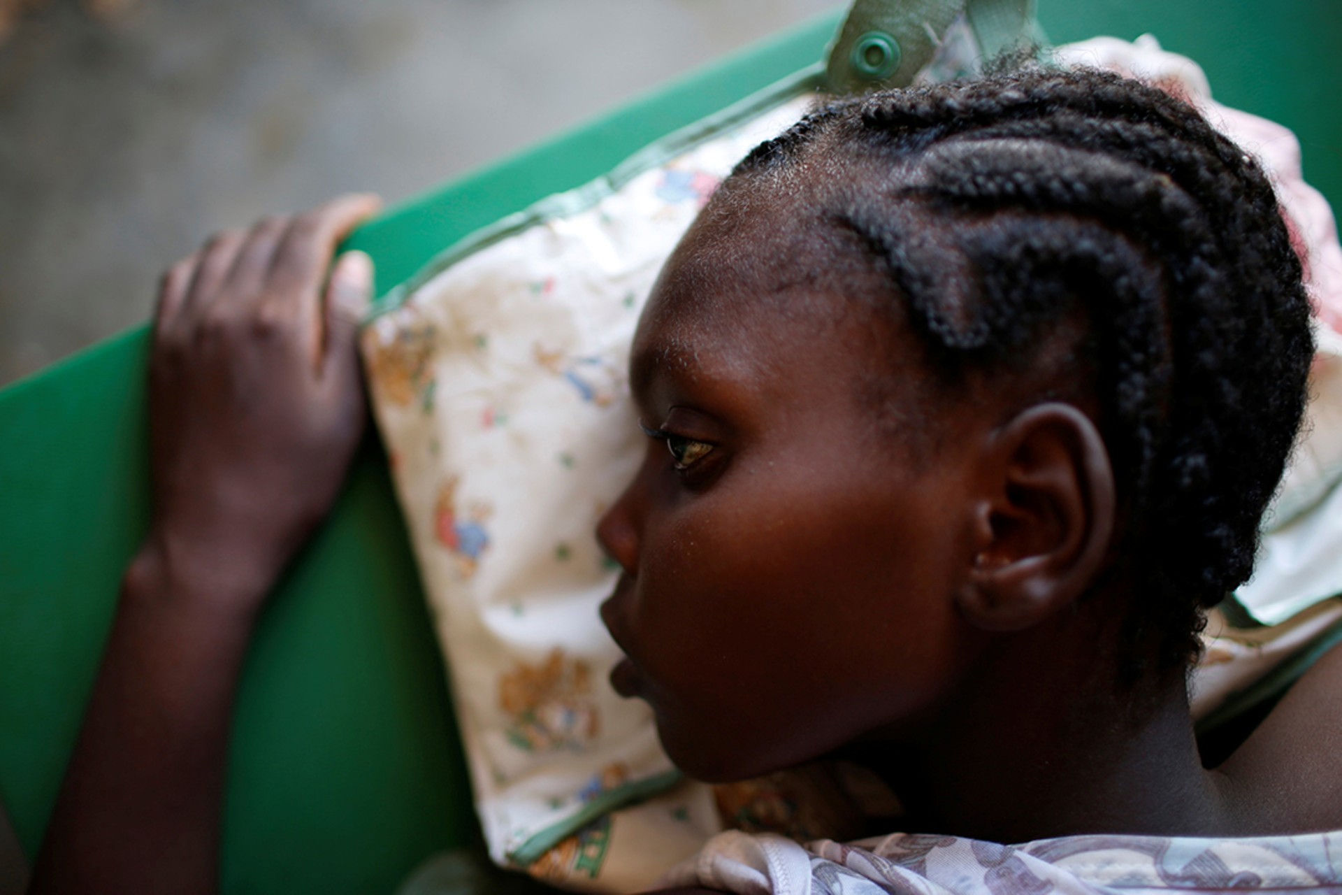 A girl receives treatment for cholera at a hospital in Jeremie, Haiti, in October 2016. Carlos Garcia Rawlins/Reuters