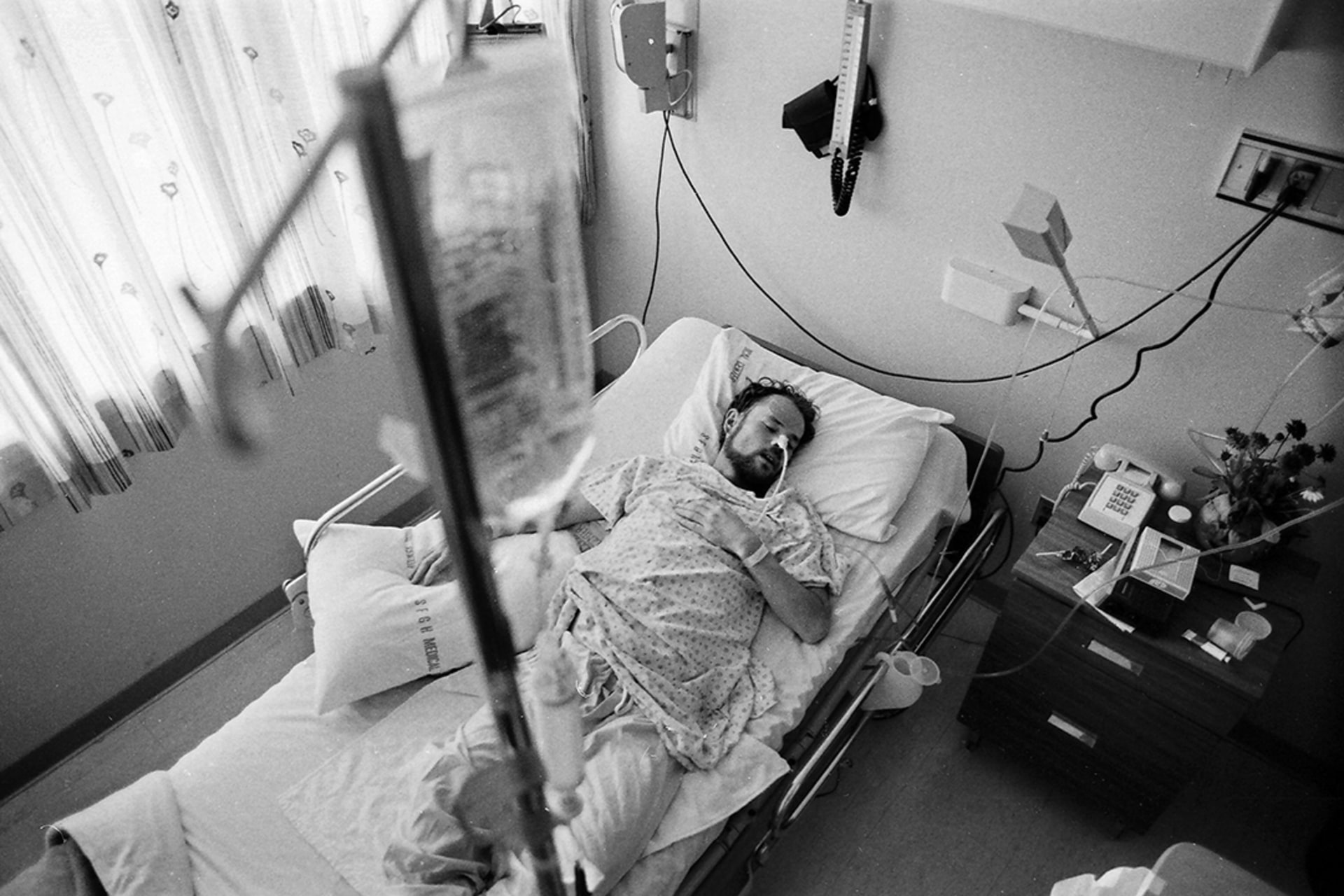 Deotis McMather, an AIDS patient, sleeps in his bed at a San Francisco hospital in 1983. Steve Ringman/San Francisco Chronicle/Getty Images