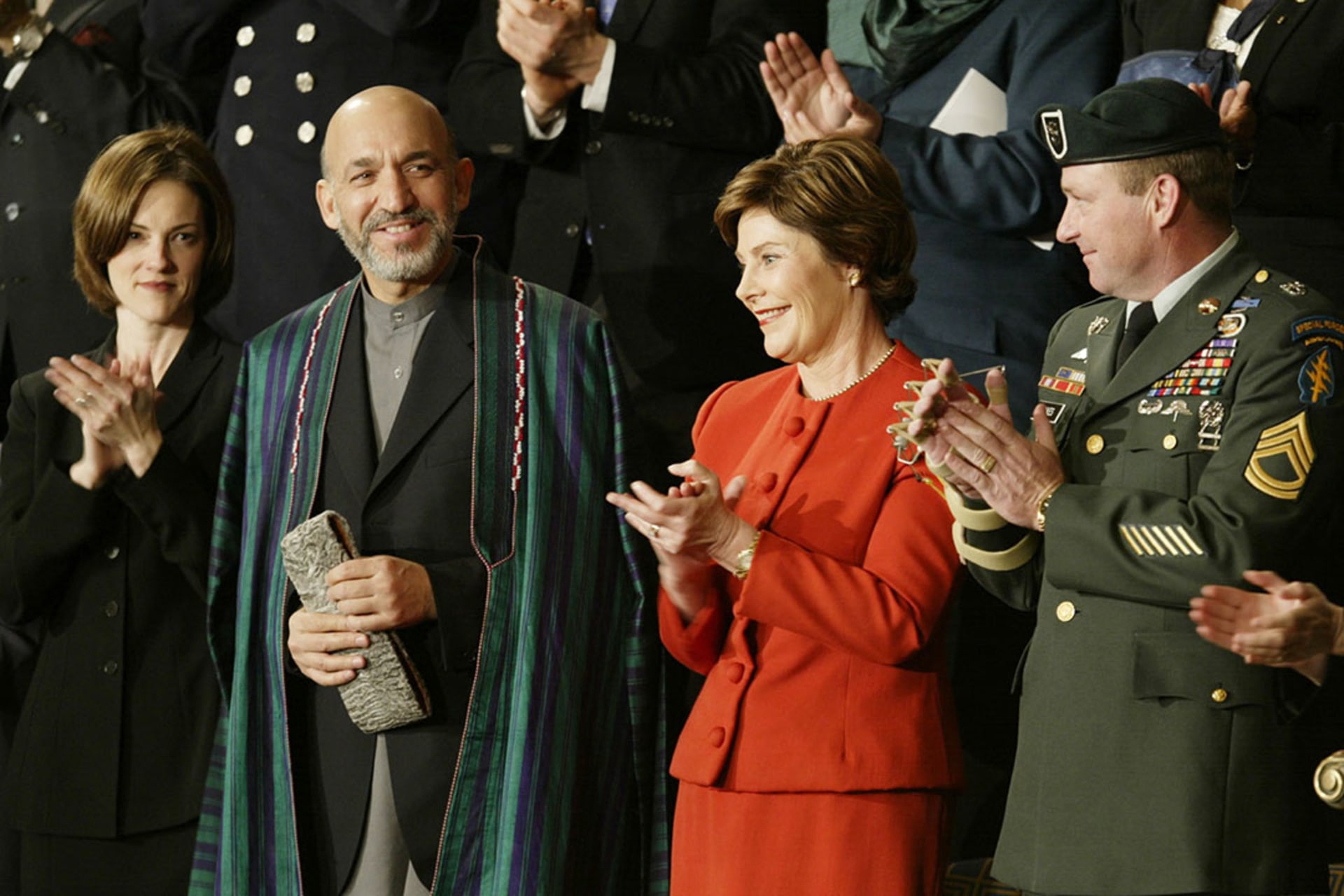 Afghan leader Hamid Karzai attends the 2002 State of the Union address alongside U.S. First Lady Laura Bush. Win McNamee/Reuters