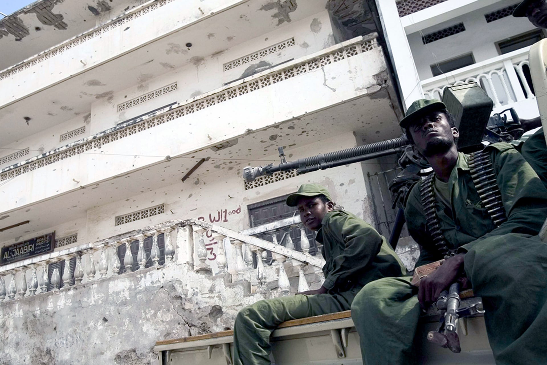 Somali forces loyal to the Transition Federal Government (TFG) patrol the streets in Mogadishu. Peter Delarue/AFP/Getty Images
