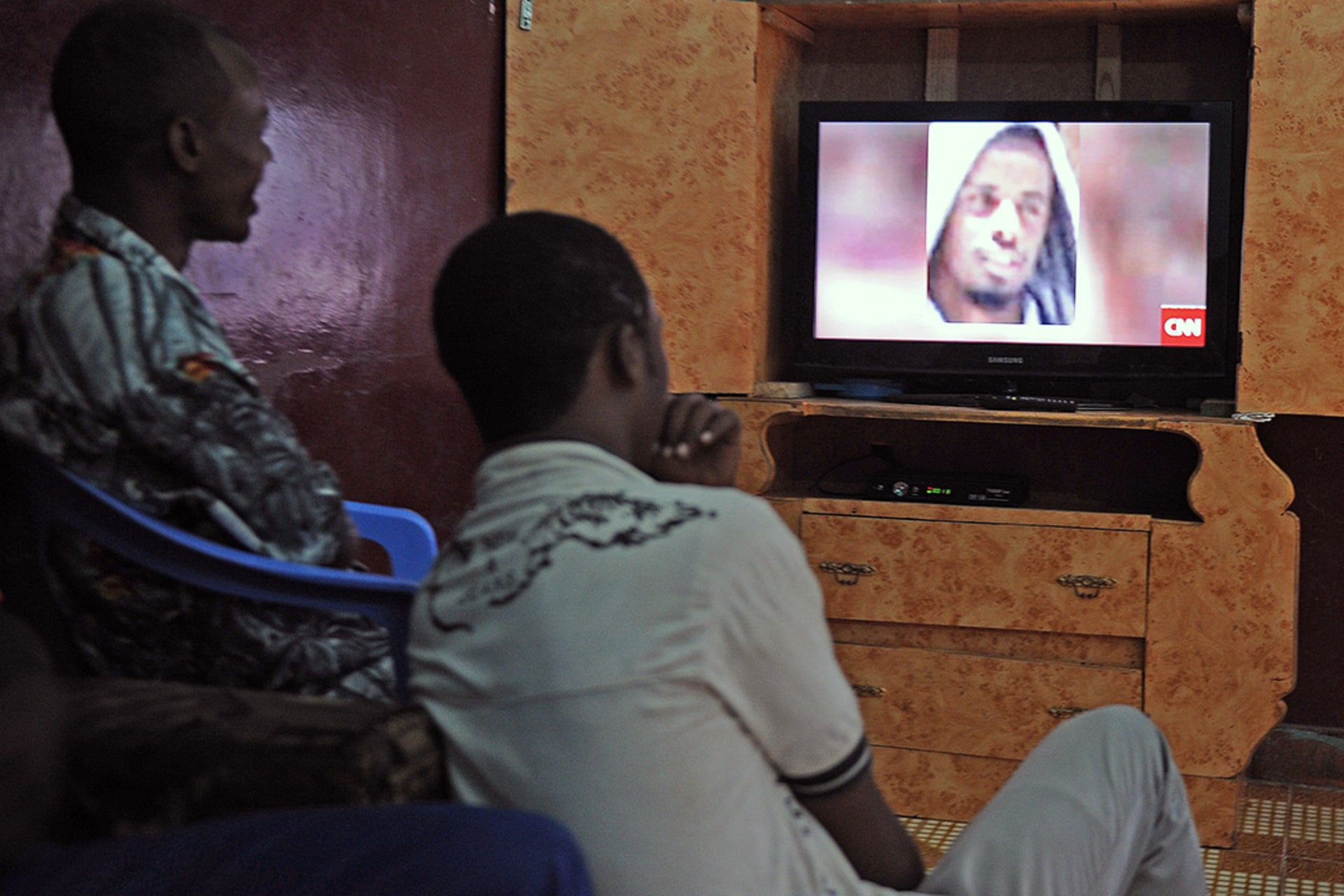 A news broadcast shows slain al-Shabaab leader Ahmed Abdi Godane. Mohamed Abdiwahab/AFP/Getty Images
