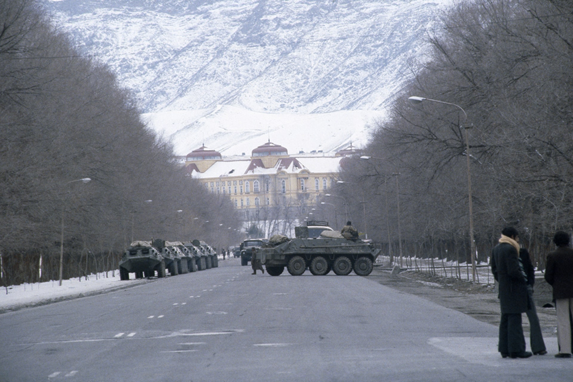 Soviet tanks take positions in front of the Darul Aman Palace, which houses the Afghan Defense Ministry, in the outskirts of Kabul.