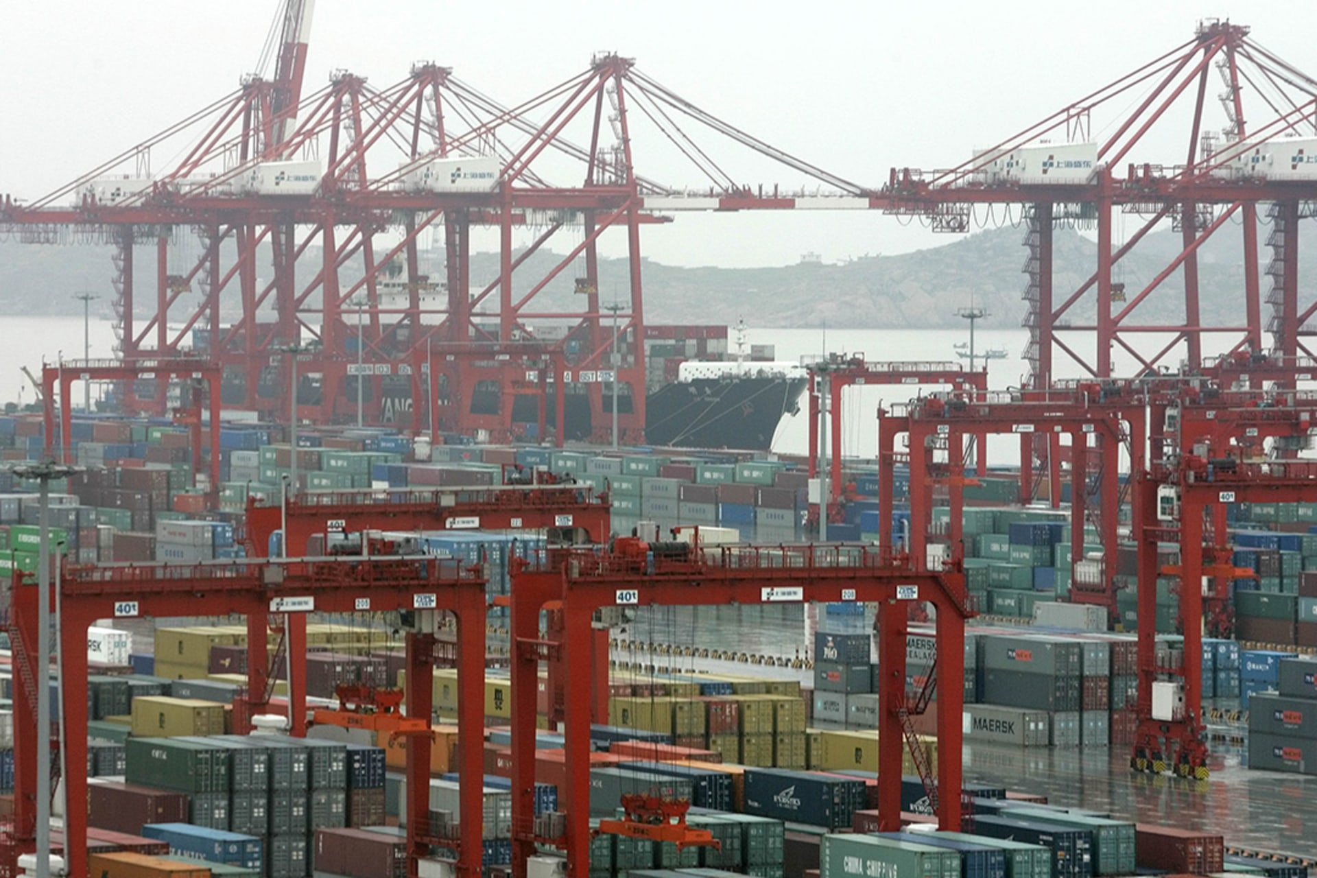 Shipping containers are seen at a deepwater port in Shanghai.